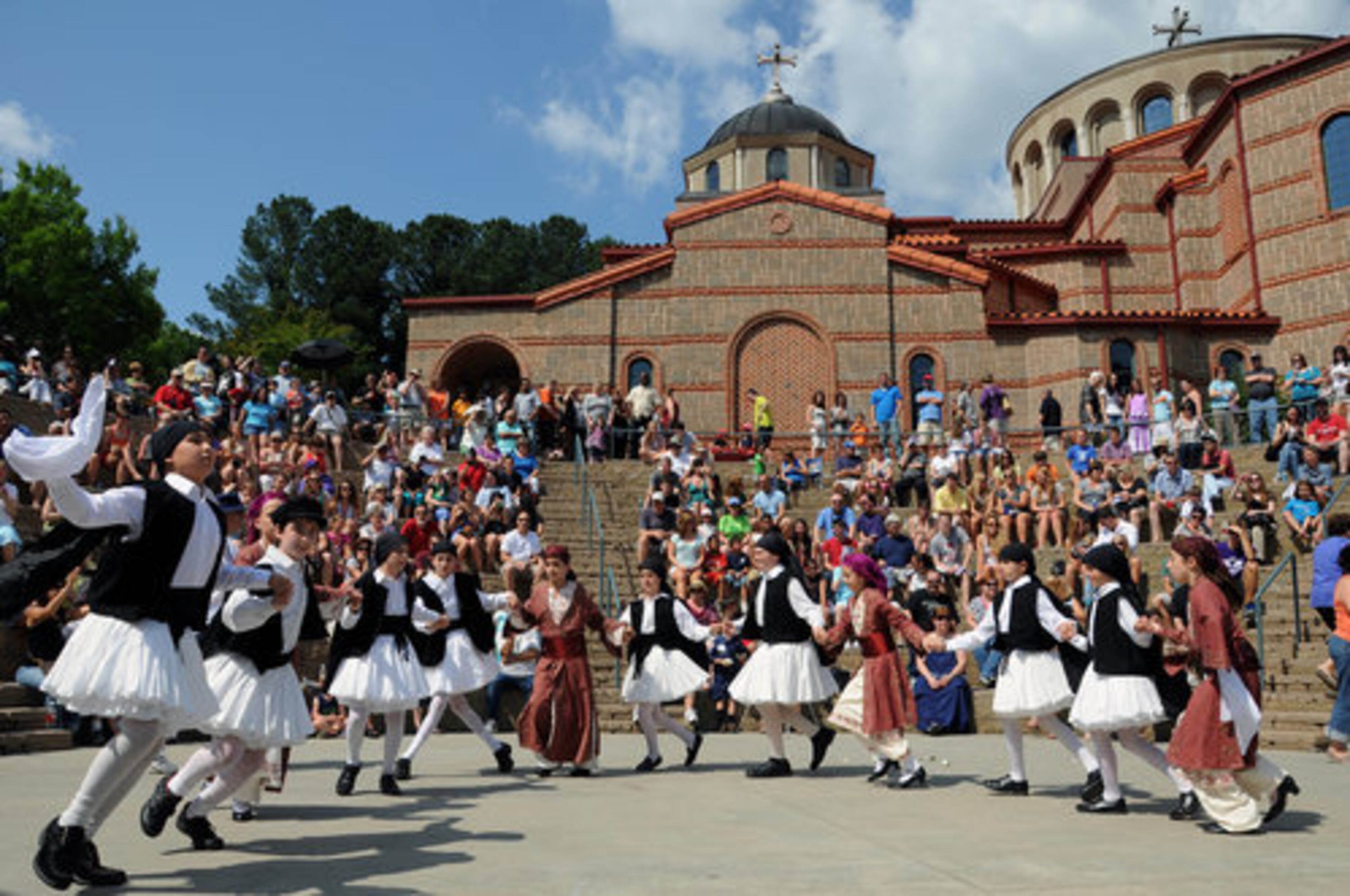 Young dancers perform an Hellenic dance at the Marietta Greek Festival in Marietta. The festival runs through Sunday at Holy Transfiguration Greek Orthodox Church.