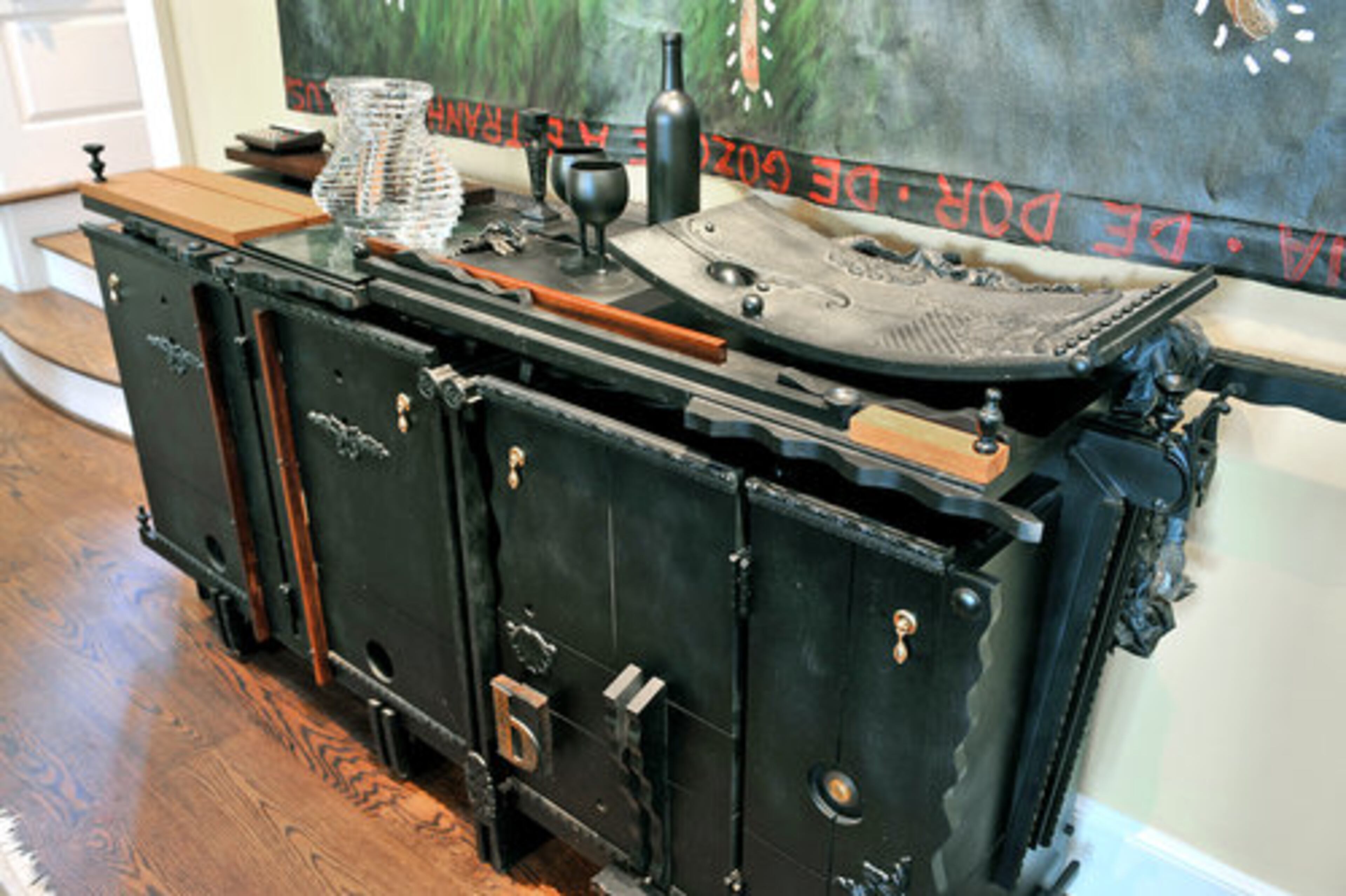 Halpern commissioned this unusual buffet from Georgia Tech design professor Peter Pittman, known for building non-functional furniture as works of art. This is one of few, if not the only, functional pieces of furniture Pittman has created, Halpern said.