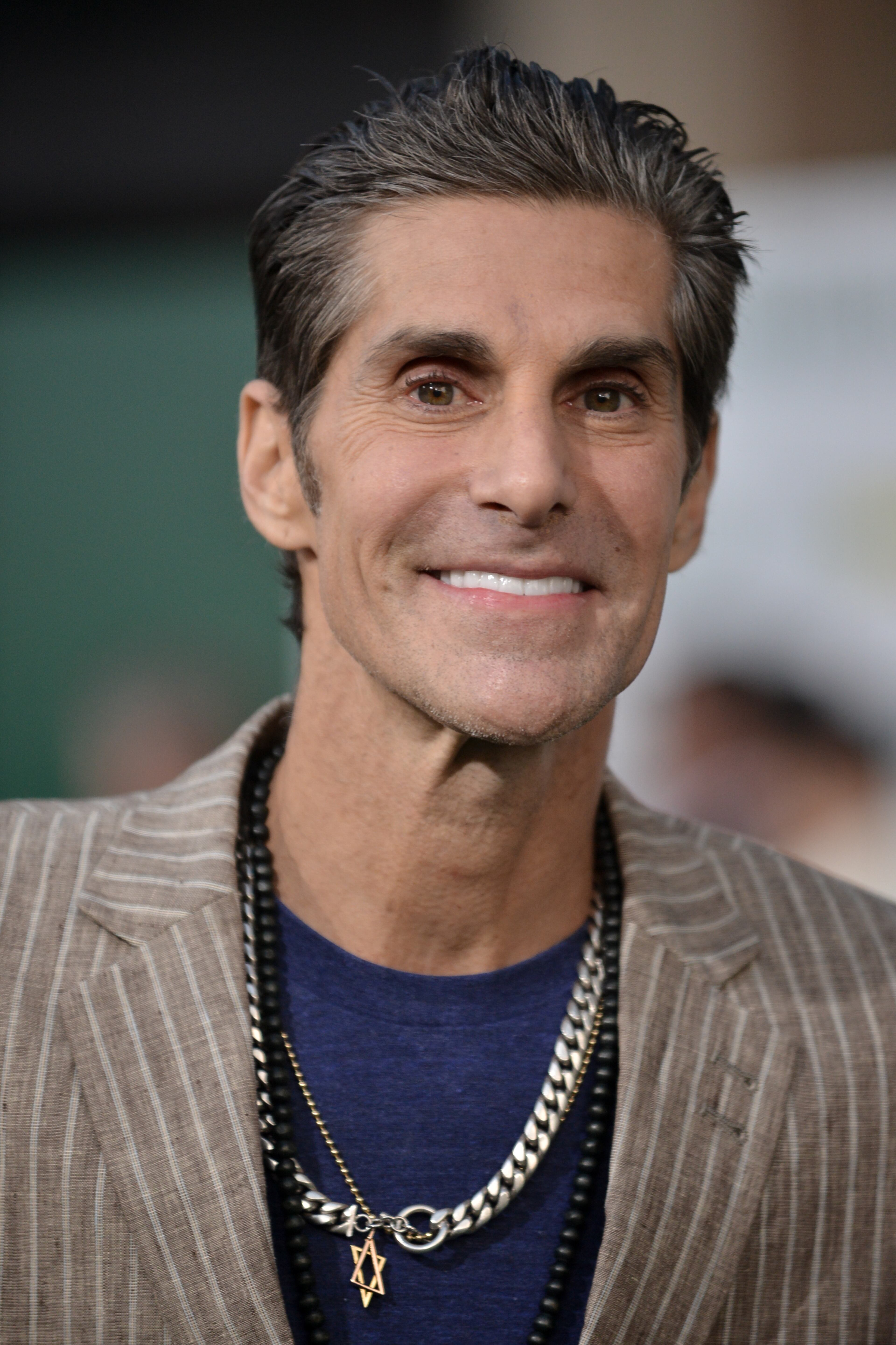 Perry Farrell arrives at the world premiere of "Million Dollar Arm" on Tuesday, May 6, 2014 in Los Angeles. (Photo by Richard Shotwell/Invision/AP)