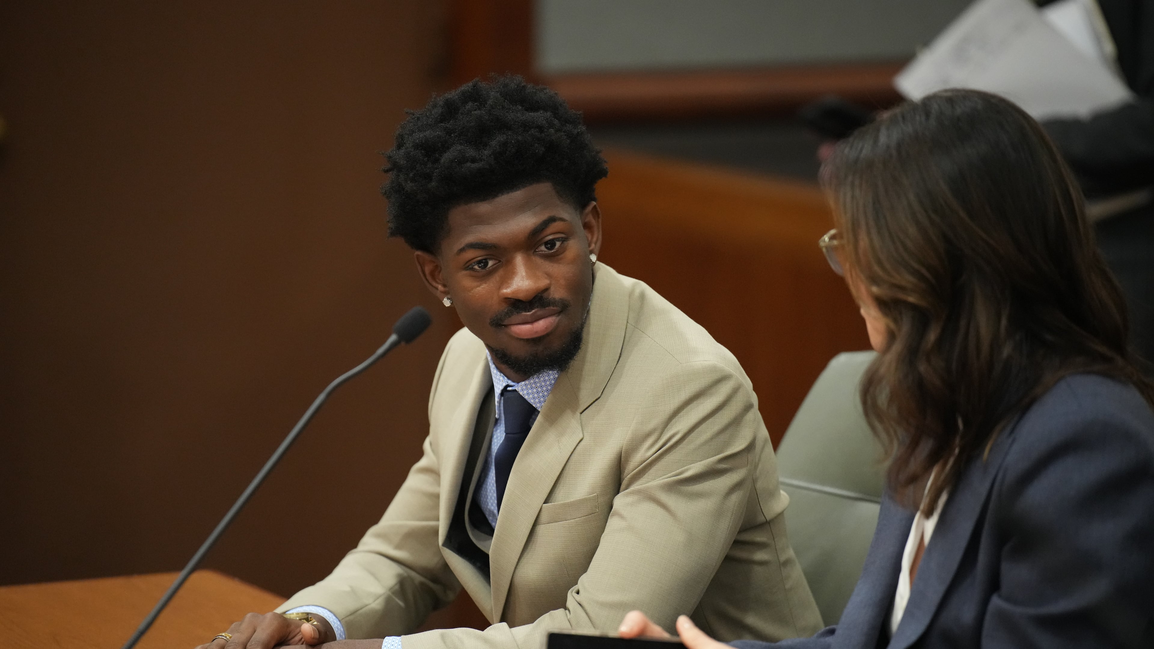 FILE - Lil Nas X, whose legal name is Montero Lamar Hill, appears in court on March 12, 2026, in Los Angeles, charged with four felony counts, including three counts of battery with injury on a police officer. (Daniel Cole/Pool Photo via AP, File)