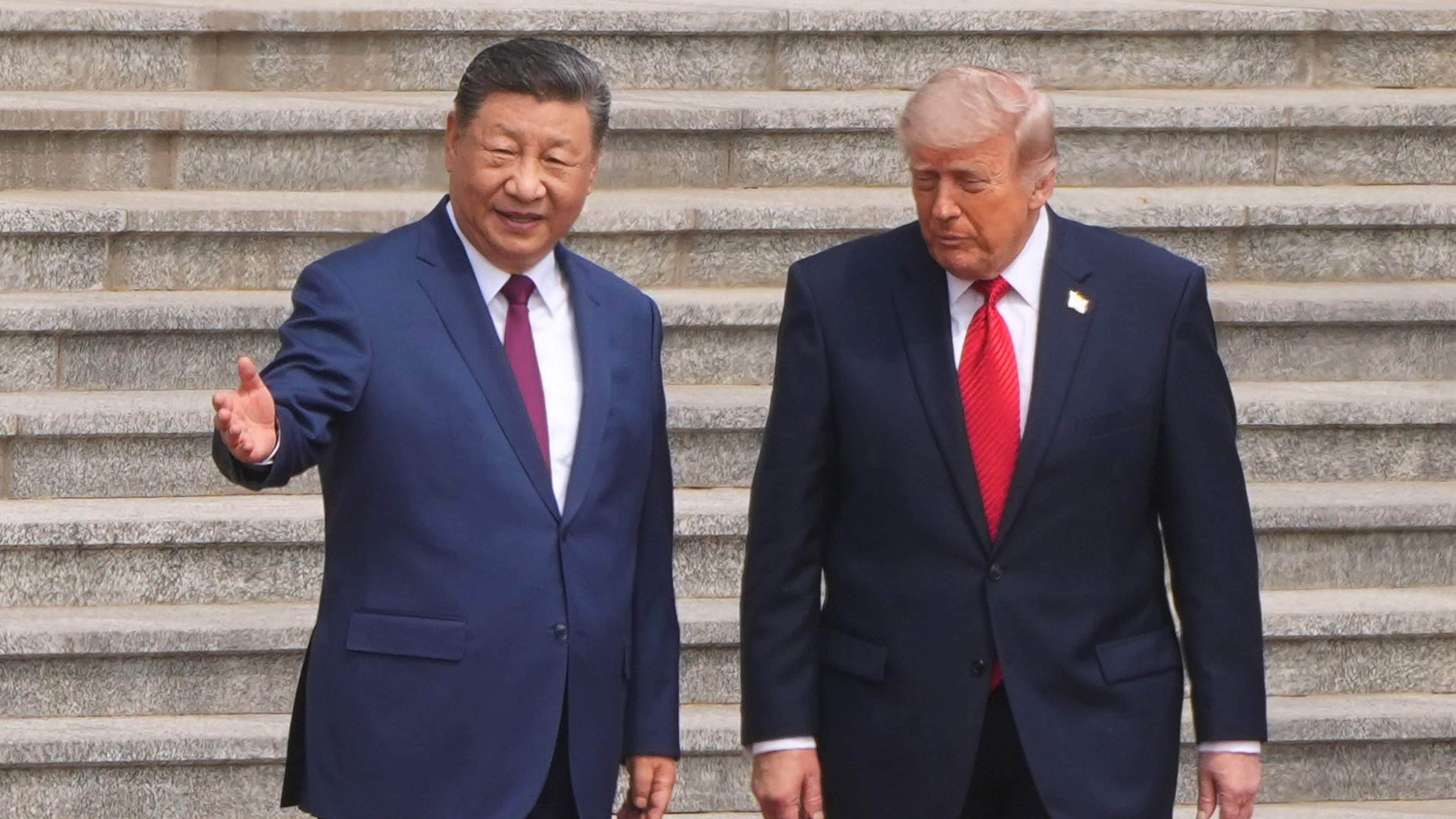 FILE - President Donald Trump participates in a welcome ceremony with China's President Xi Jinping at the Great Hall of the People, May 14, 2026, in Beijing. (AP Photo/Mark Schiefelbein, File)