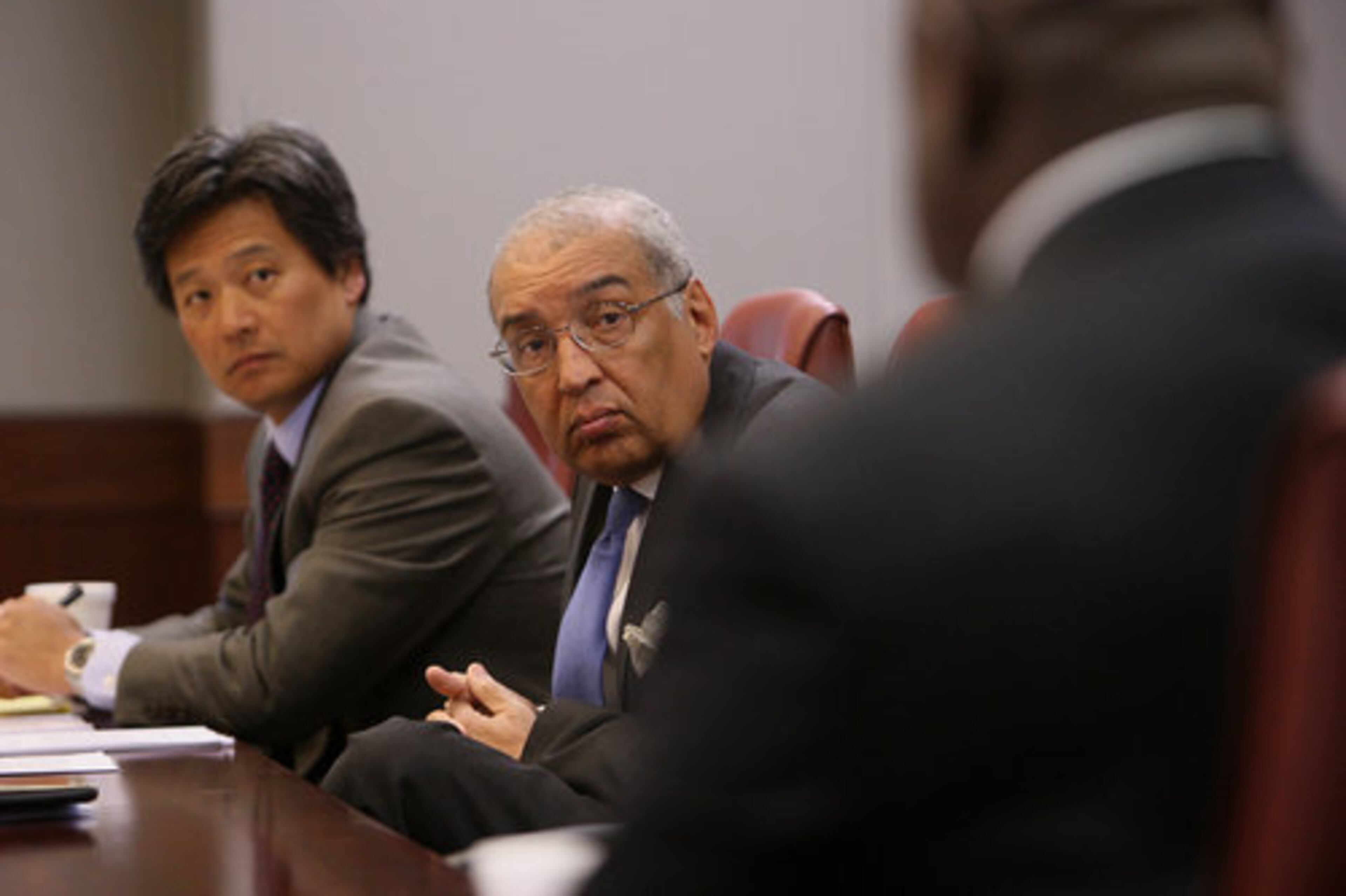 Attorneys from Schiff Hardin Han Choi and Lewis Horne Jr. are in attendance on Monday, March 7, 2011, at an emergency meeting of the Fulton-DeKalb Hospital Authority .