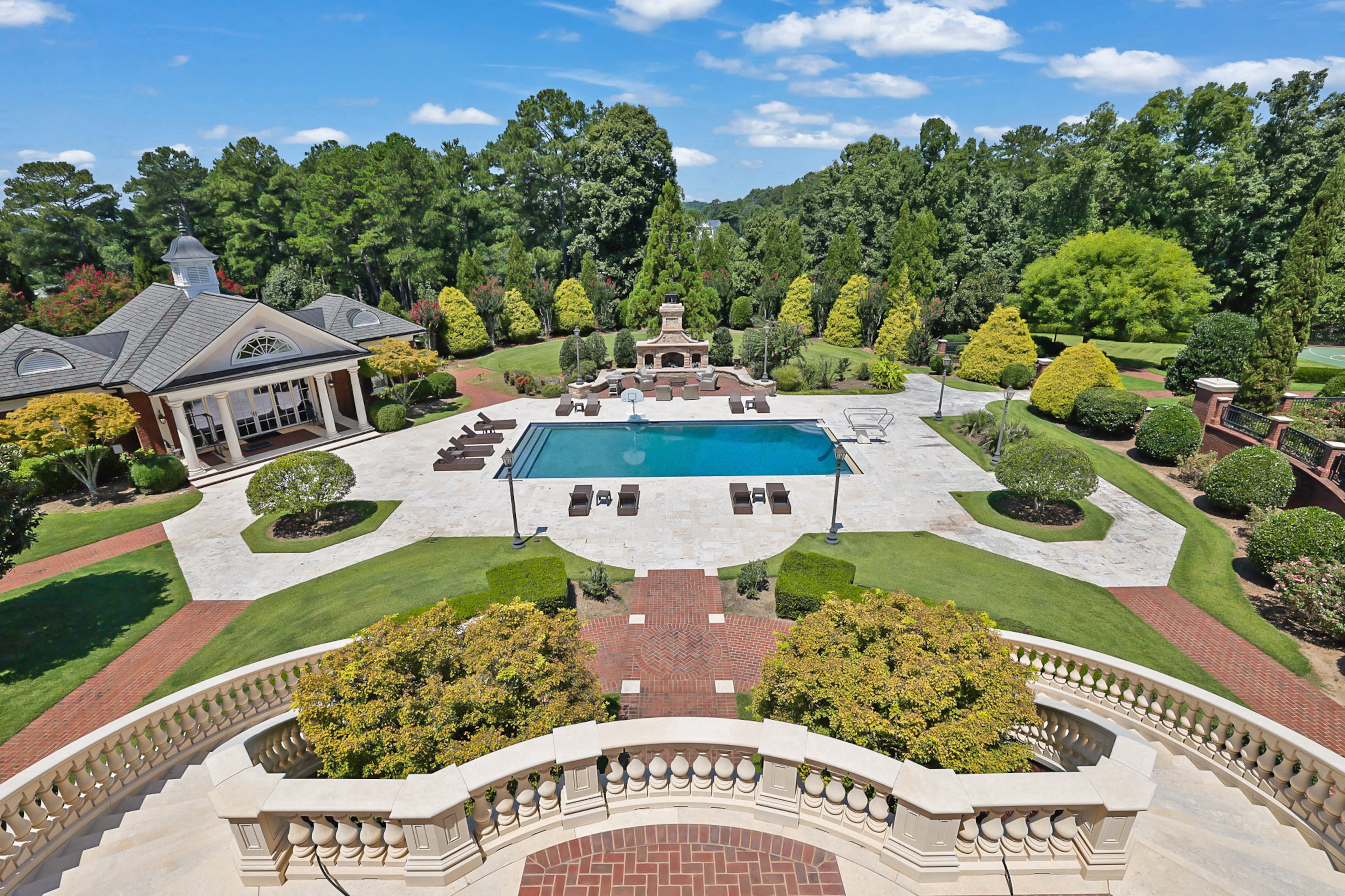 Dwight Howard's Suwanee backyard features saltwater pool, expansive landscaped grounds, gardens and an orchard. (Courtesy of HomeSmart)