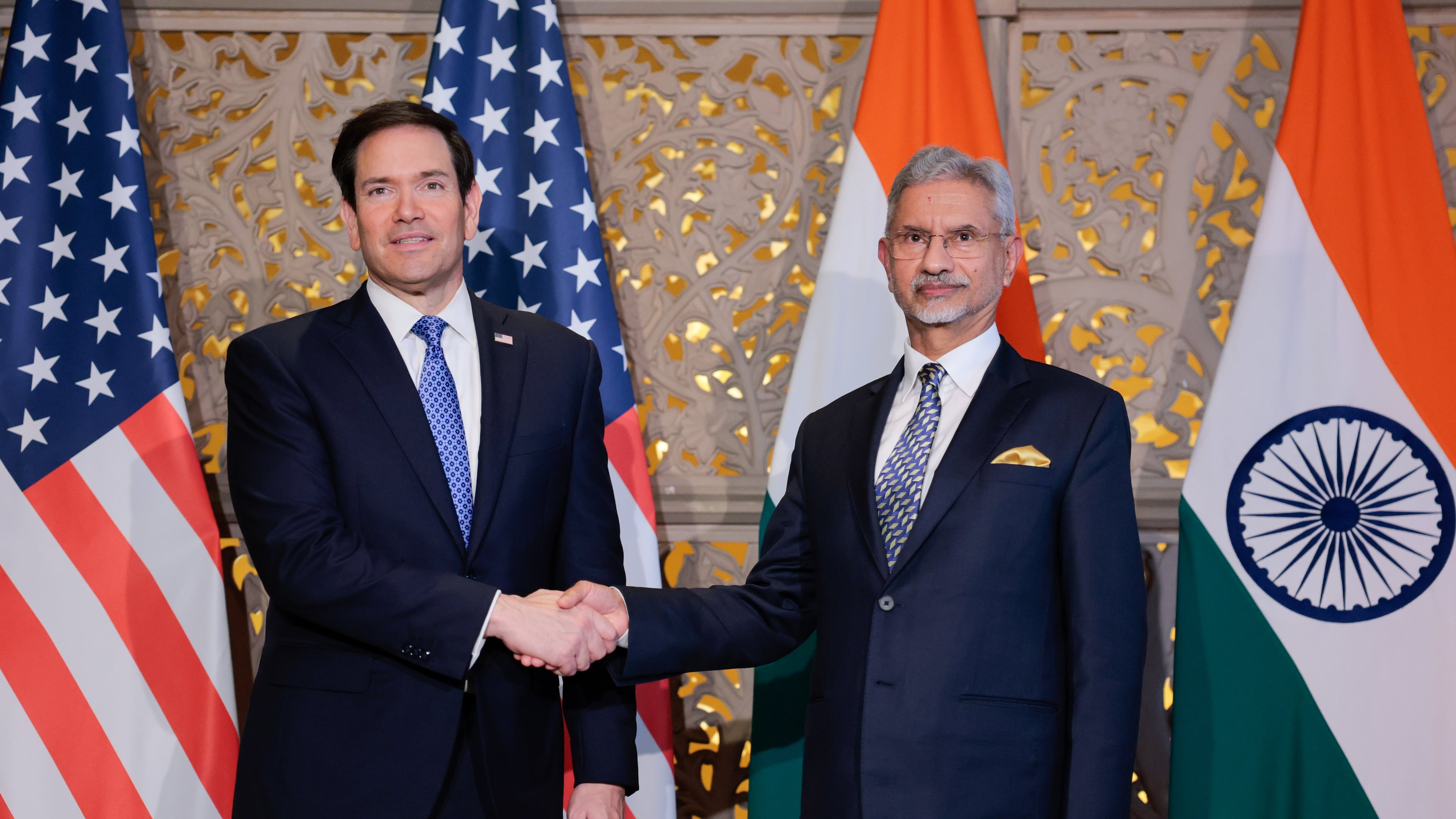 US Secretary of State Marco Rubio, left, shakes hands with India's Foreign Minister Subrahmanyam Jaishankar, right, before their meeting in Mumbai, India, Tuesday, Oct. 20, 2026. (Kylie Cooper/Pool Photo via AP)