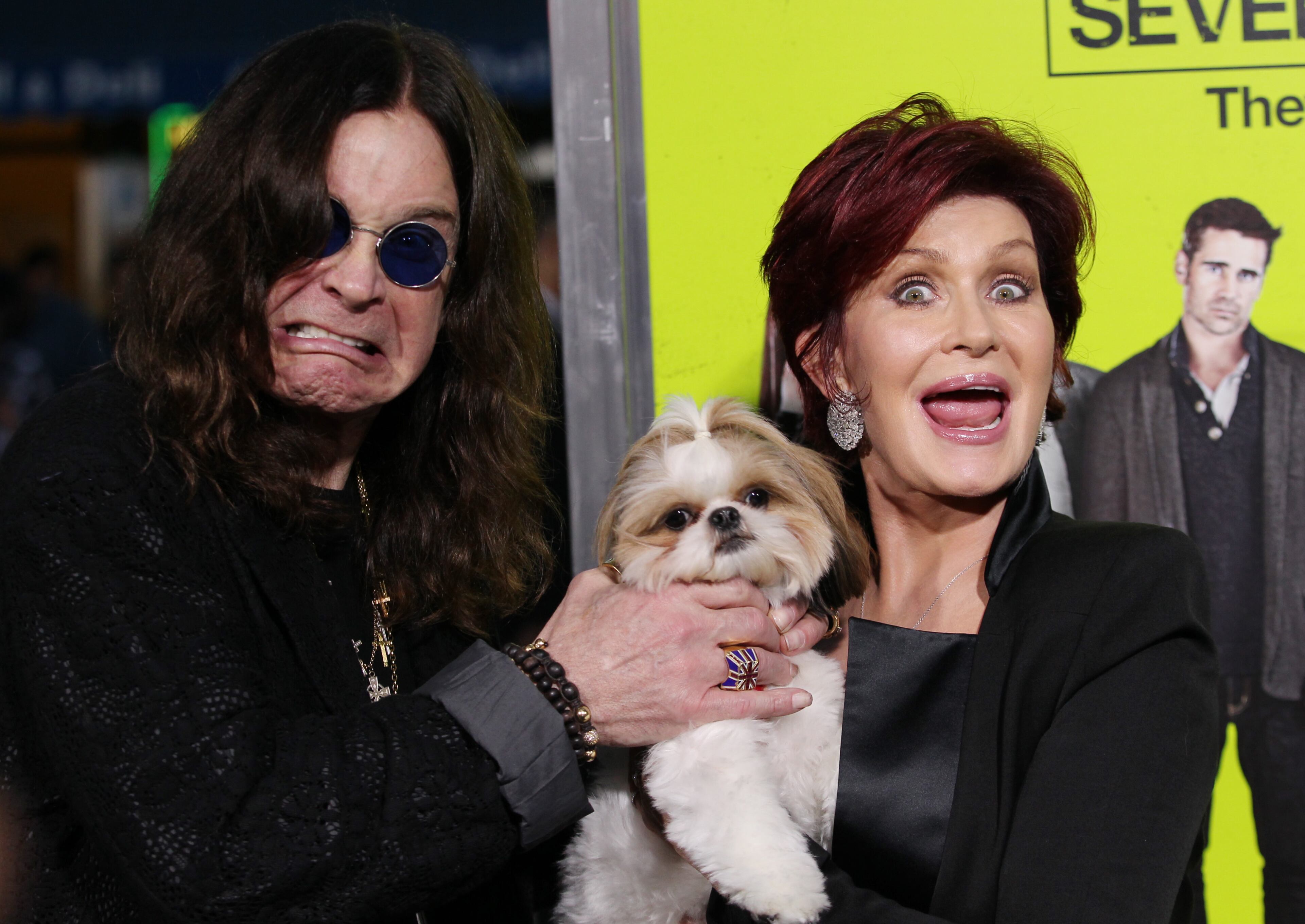 Ozzy Osbourne, left, and Sharon Osbourne, right, pose with Bonny the dog at the premiere of "Seven Psychopaths" at the Bruin Theatre on Monday, Oct. 1 in Los Angeles.