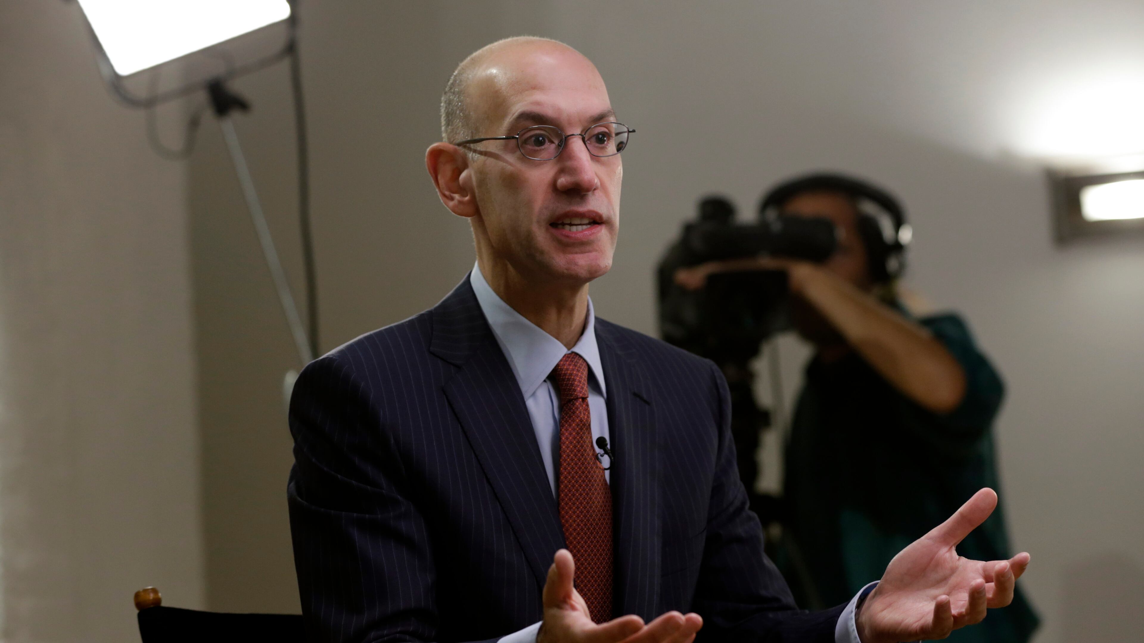 Adam Silver, commissioner of the National Basketball Association (NBA), speaks during a Bloomberg Television interview at the Bloomberg Sports Business Summit in New York, U.S., on Thursday, Sept. 4, 2014. Silver said legalized sports gambling in the U.S. is likely to spread and the National Basketball Association expects to profit from it. Photographer: Peter Foley/Bloomberg *** Local Caption *** Adam Silver NBA commissioner Adam Silver mandated Donald Sterling's exit over racist comments. (Peter Foley/Bloomberg)
