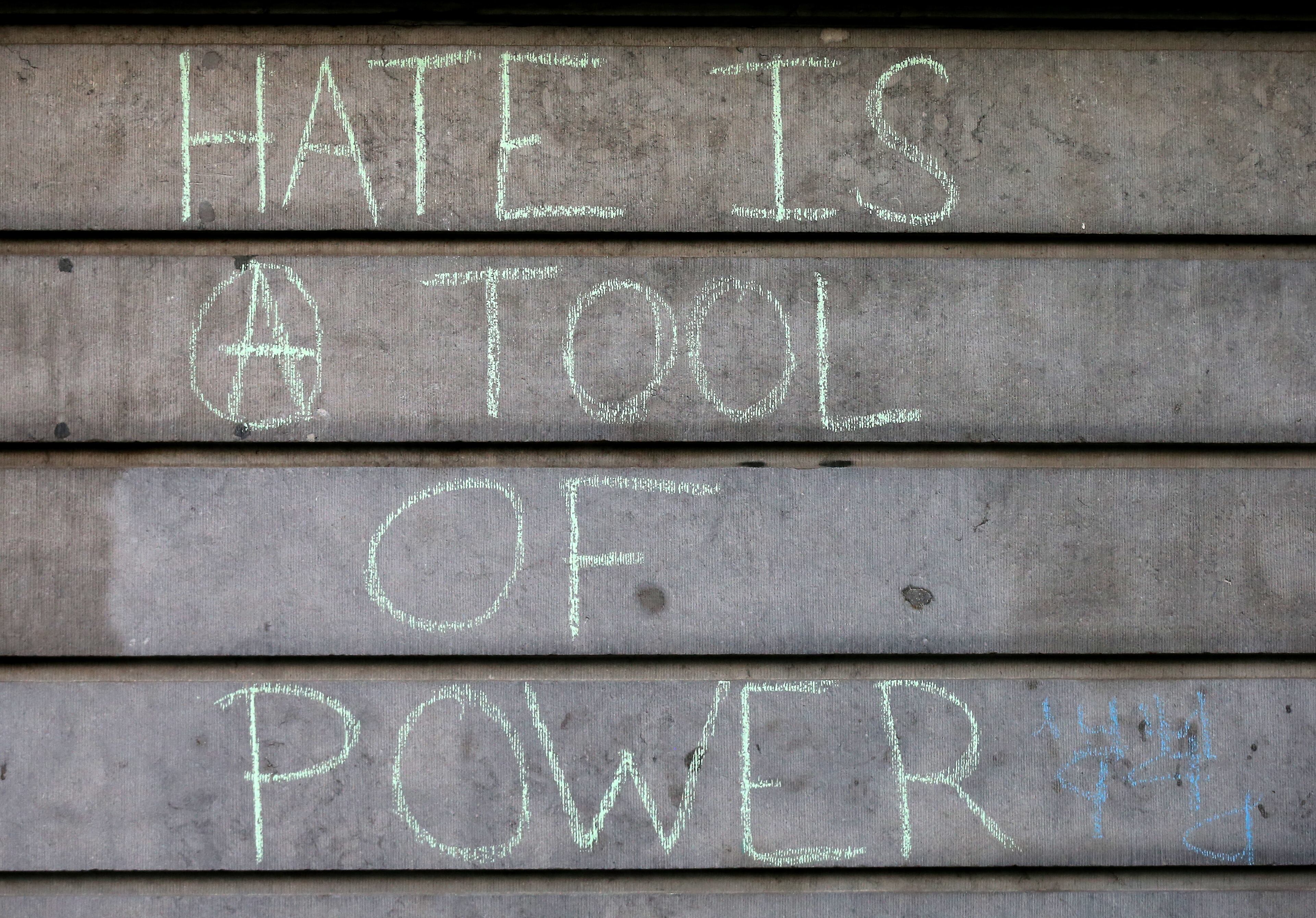 BRUSSELS, BELGIUM - MARCH 22: A message is written on a wall following today's attacks on March 22, 2016 in Brussels, Belgium. At least 31 people are thought to have been killed after Brussels airport and a Metro station were targeted by explosions. The attacks come just days after a key suspect in the Paris attacks, Salah Abdeslam, was captured in Brussels. (Photo by Carl Court/Getty Images)