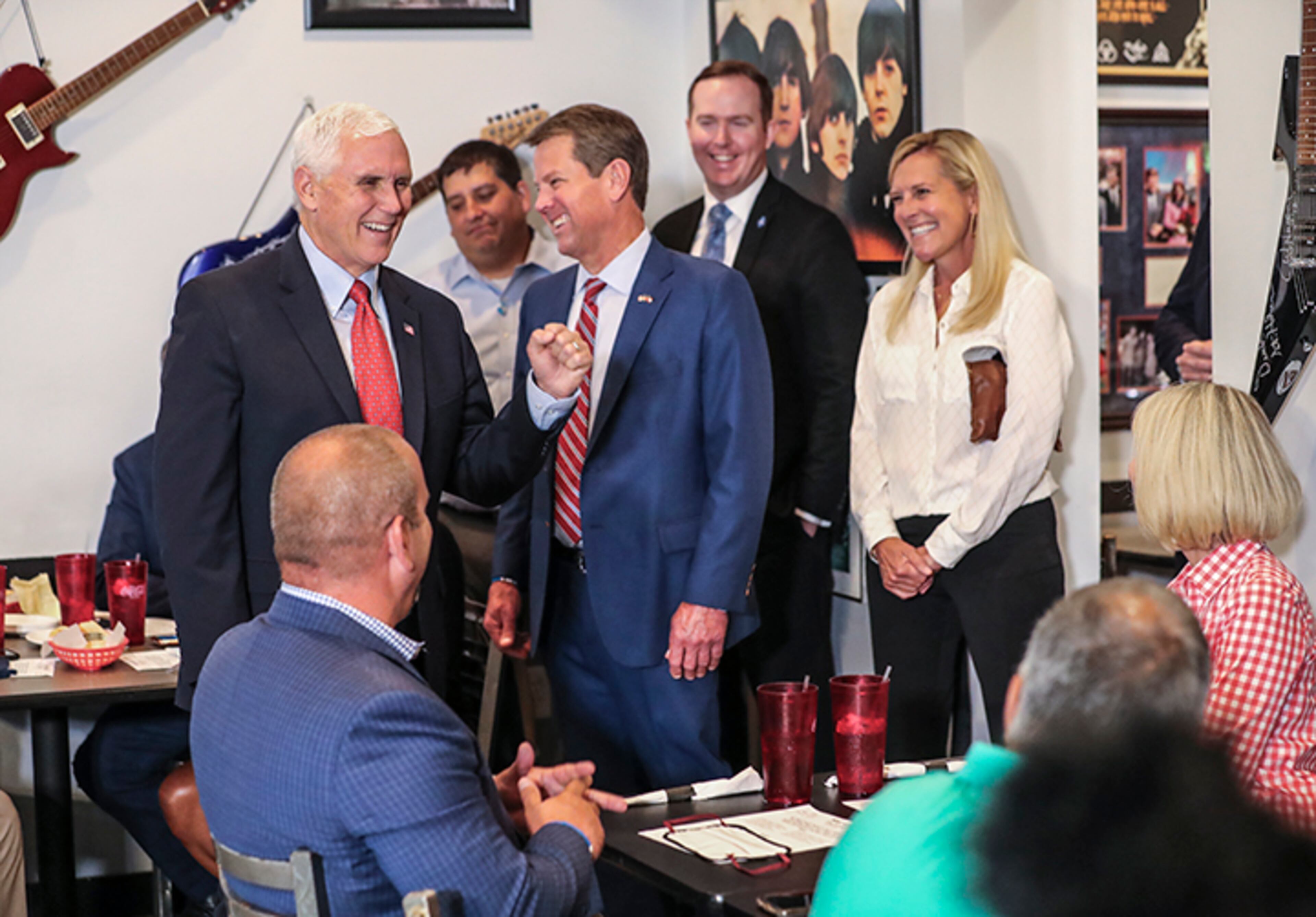 Vice President Mike Pence (left), Gov. Brian Kemp (center) and first lady Marty Kemp at the Star Cafe in Atlanta on Friday, May 22, 2020. (Photo: JOHN SPINK/JSPINK@AJC.COM)