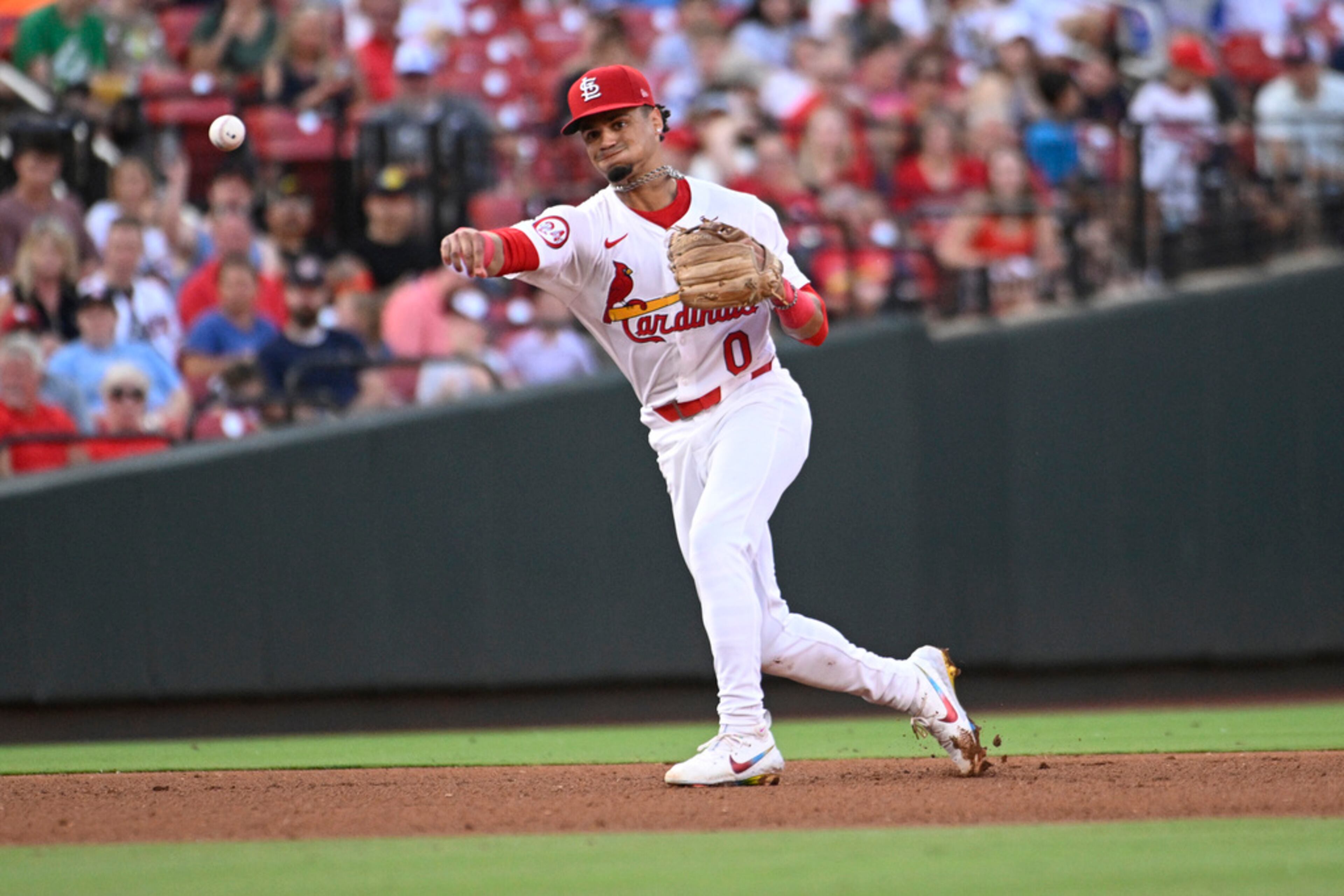 St. Louis Cardinals shortstop Masyn Winn throws out Atlanta Braves' Travis d'Arnaud at first base during the fifth inning in the second game of a baseball doubleheader Wednesday, June 26, 2024, in St. Louis. (AP Photo/Joe Puetz)
