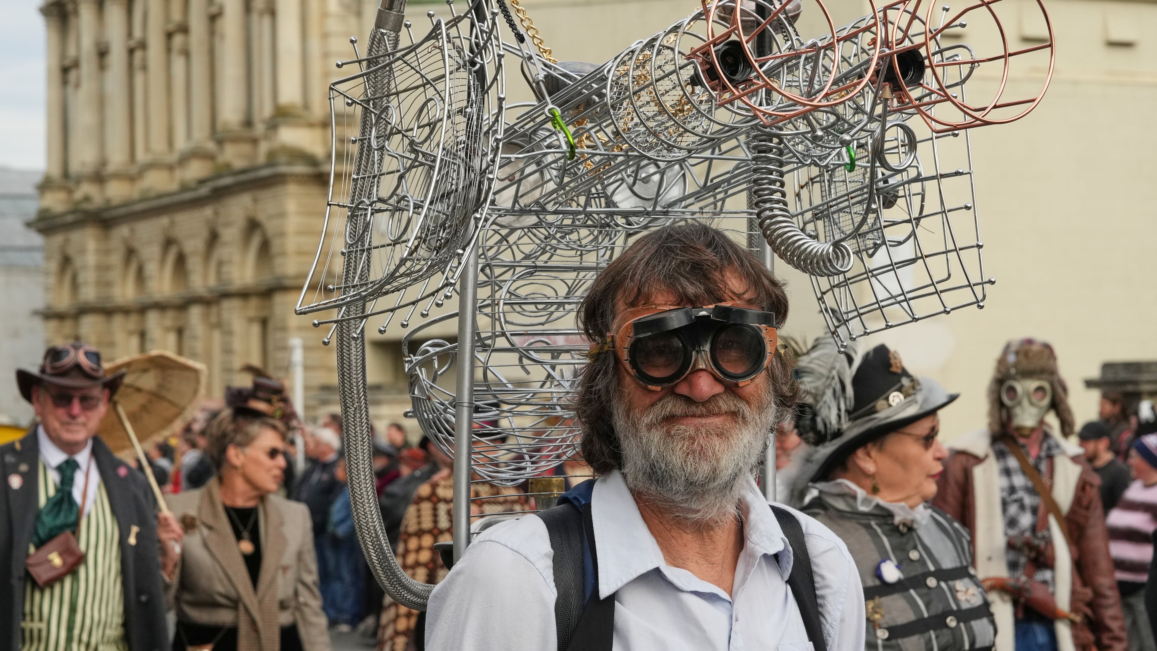 A participant reacts as he marches in a parade at the Steampunk NZ Festival in Ōamaru, New Zealand, on May 30 2026. (AP Photo/Charlotte Graham-McLay)