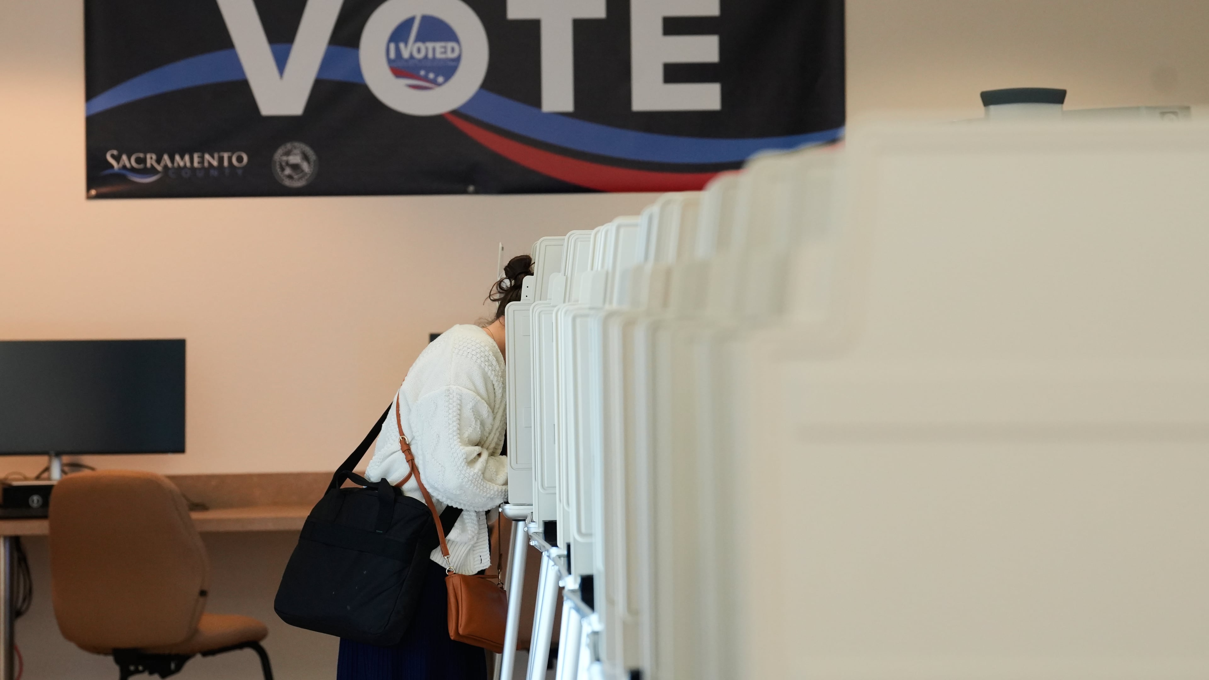 A voter casts her ballot for the California primary election on Tuesday, June 2, 2026, in Sacramento, Calif.. (AP Photo/Rich Pedroncelli)