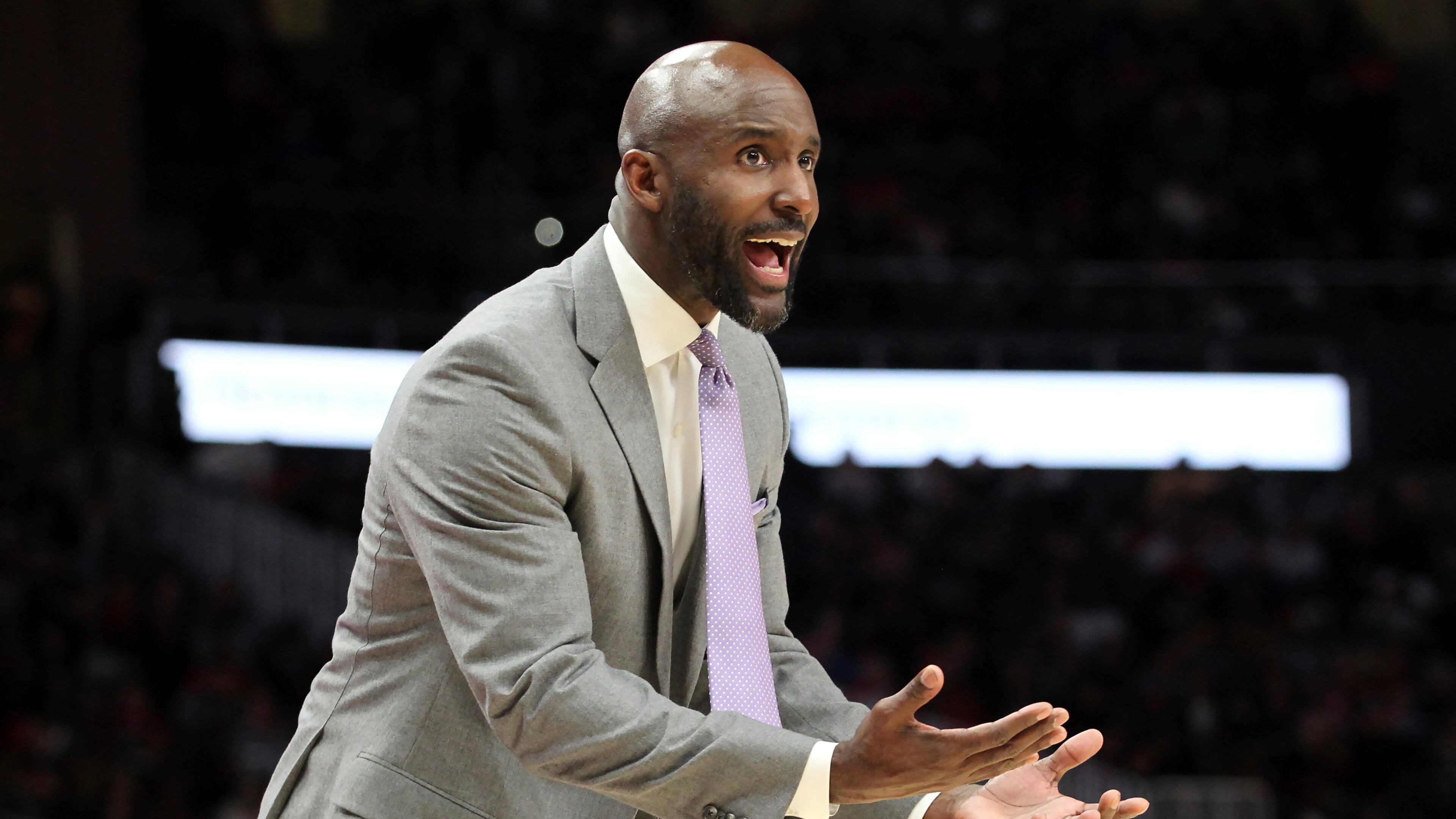 Atlanta Hawks head coach Lloyd Pierce talks to his players during the first half of an NBA basketball game against the Toronto Raptors, Saturday, Nov. 23, 2019, in Atlanta. (AP Photo/Tami Chappell)