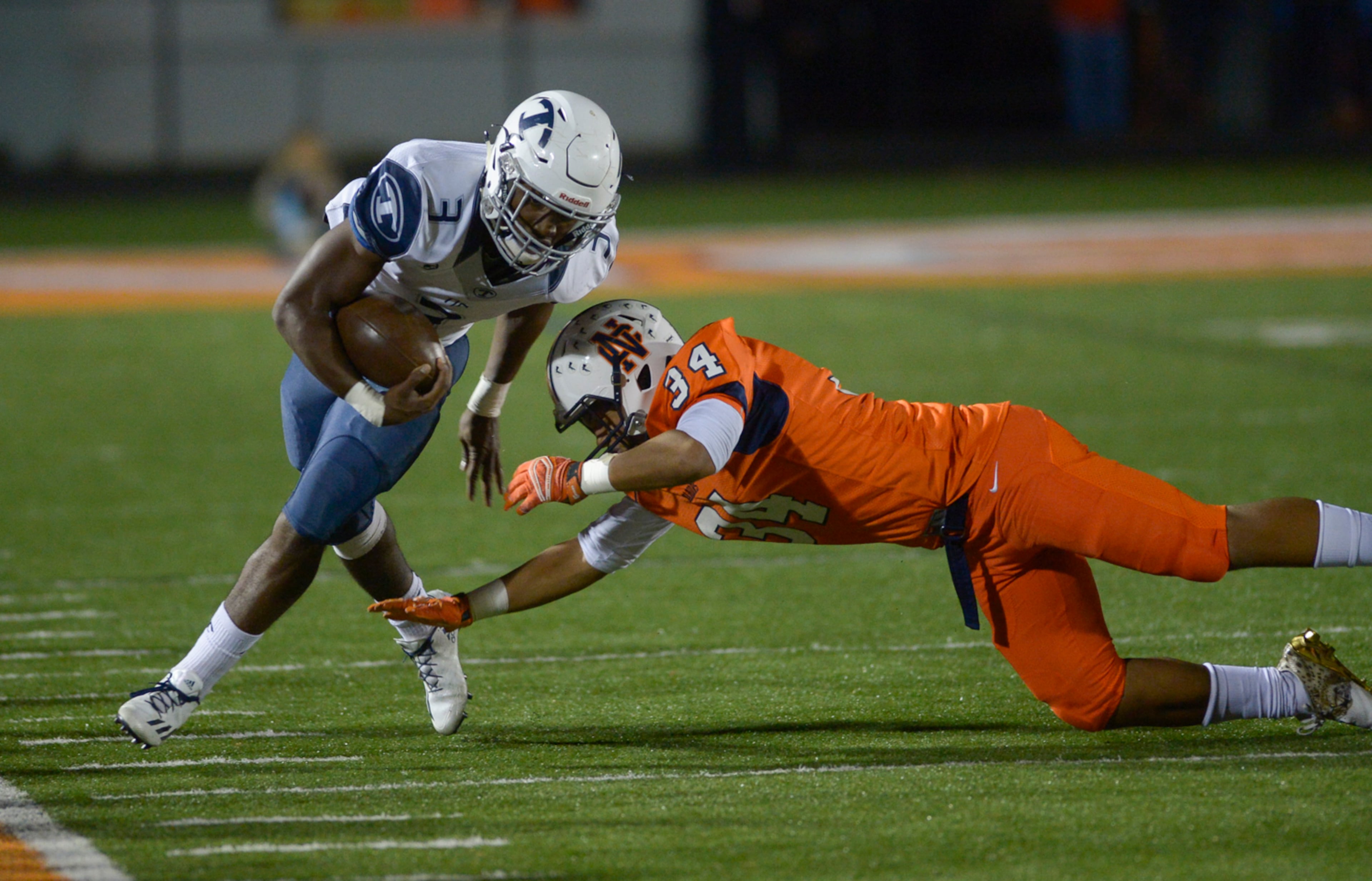 Kennesaw, Ga. -- North Cobb sophomore LB Christian Singleton (34) forces Tift County senior RB Brenton Jones (3) out of bounds during the first half of their game at North CobbFriday November 11, 2016. SPECIAL/Daniel Varnado