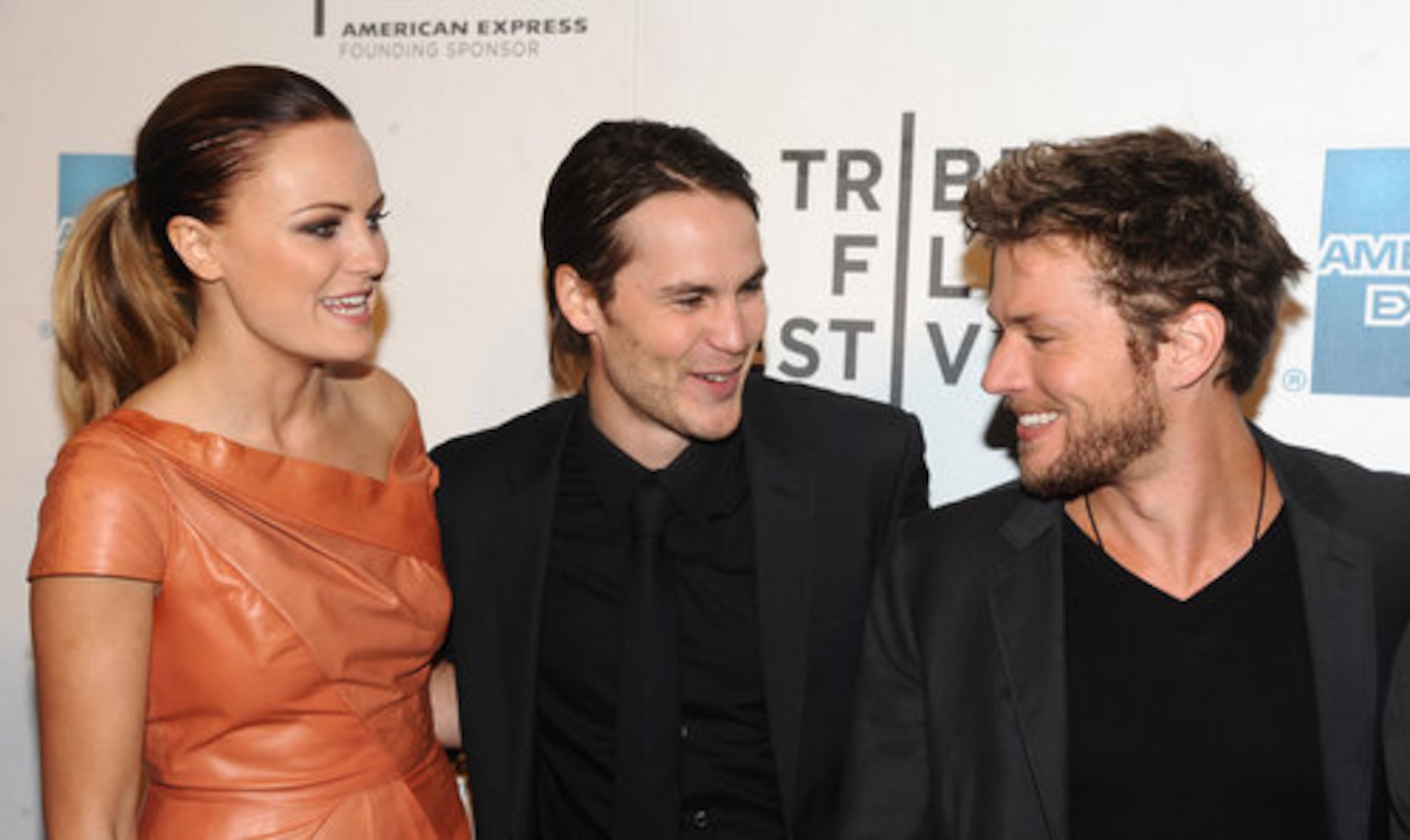 From left, actors Malin Ackerman, Taylor Kitsch and Ryan Phillippe attend the premiere of "The Bang Bang Club" during the 2011 Tribeca Film Festival on Thursday, April 21, 2011, in New York. The film is based on a true story about photographers in war zones.
