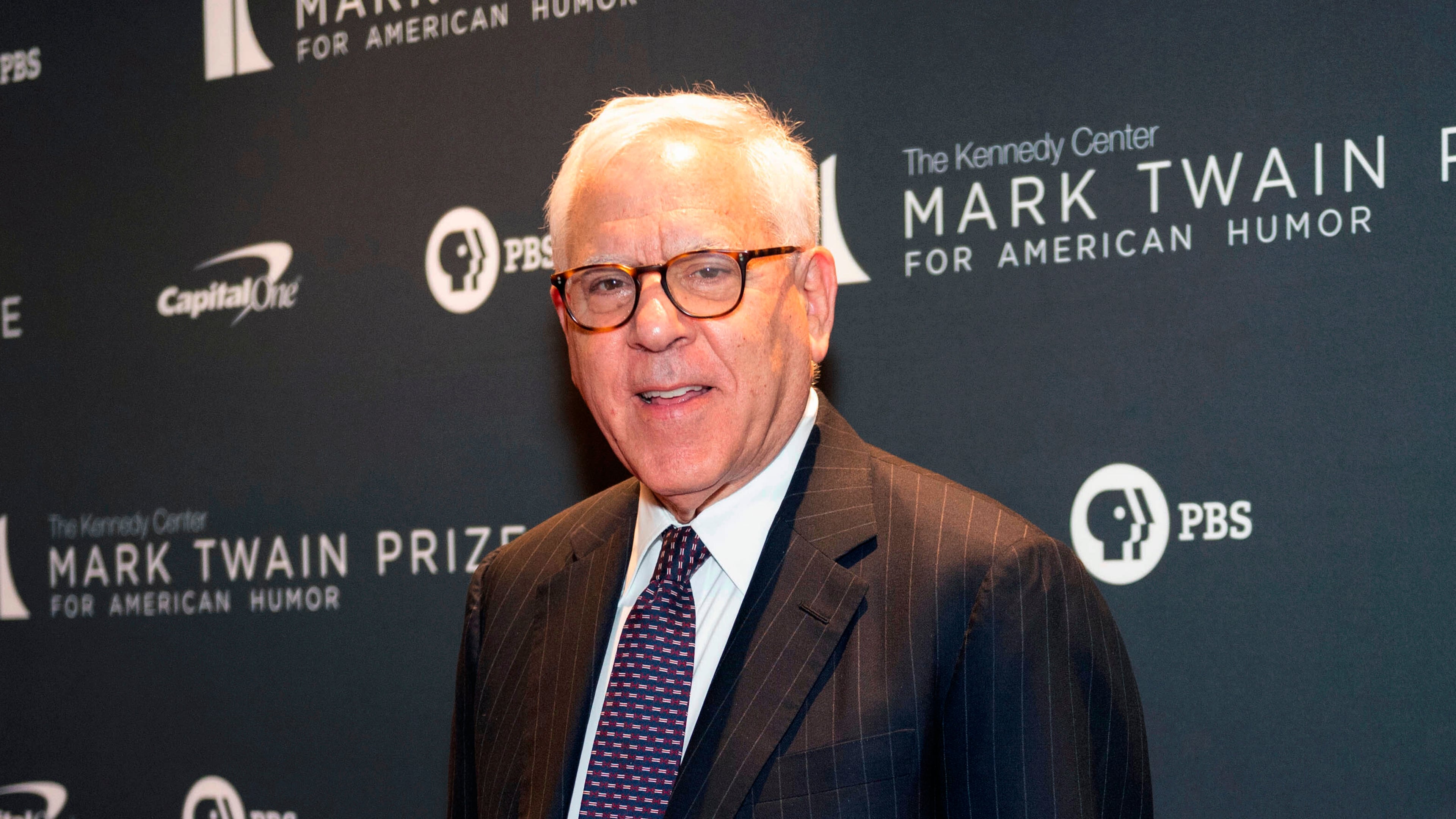 FILE - David Rubenstein appears at the Kennedy Center for the Performing Arts for the Mark Twain Prize for American Humor in Washington on April 24, 2022. (AP Photo/Kevin Wolf, File)