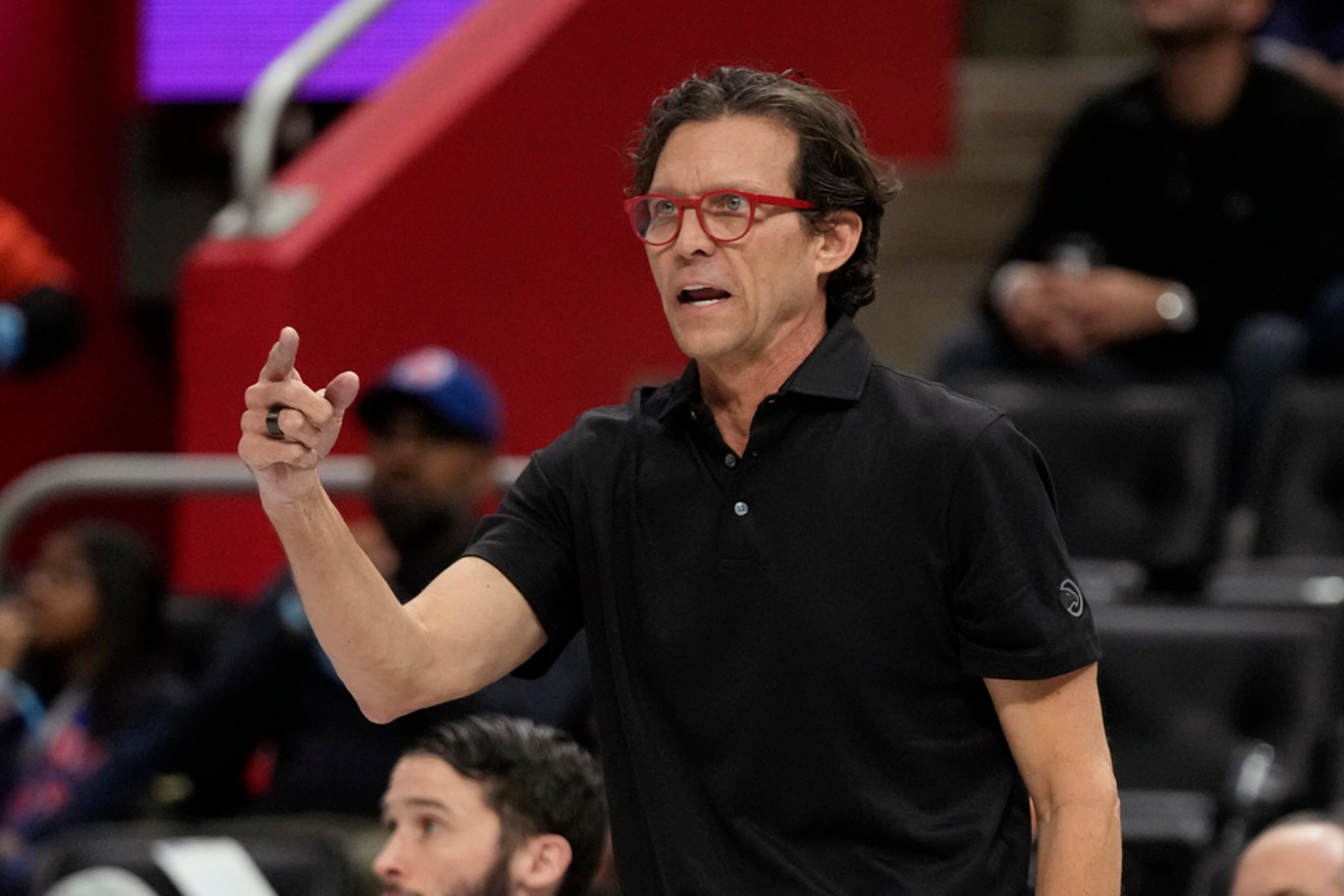 Atlanta Hawks head coach Quin Snyder directs from the sideline during the first half of an NBA basketball game against the Detroit Pistons, Tuesday, Nov. 14, 2023, in Detroit. (AP Photo/Carlos Osorio)