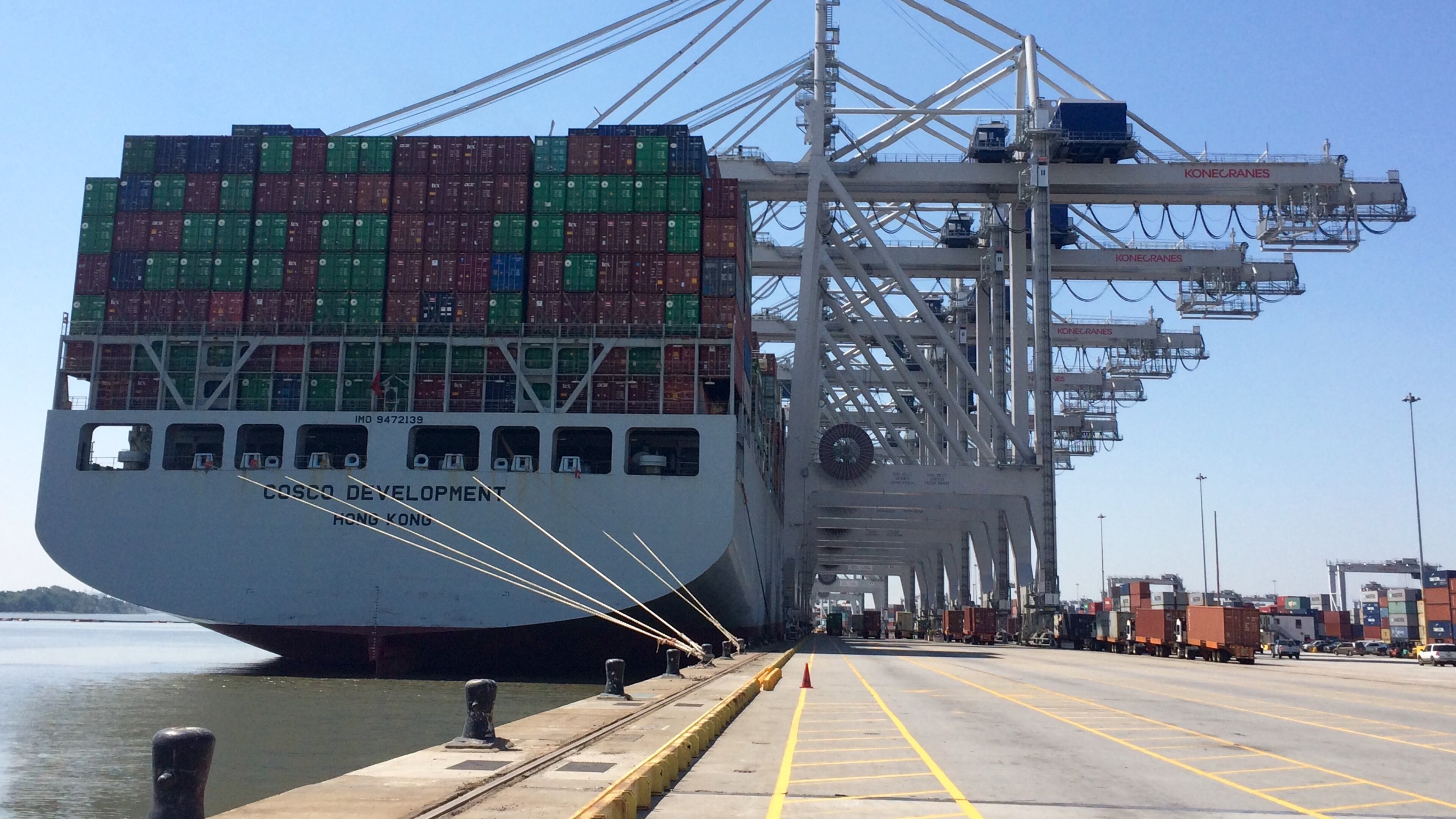 Six cranes load and unload containers Friday, May 12, 2017 at the Port of Savannah from the Cosco Development, the largest container ship to ever call on an East Coast port. The ship called on Savannah May 11-12, 2017. J. Scott Trubey/strubey@ajc.com