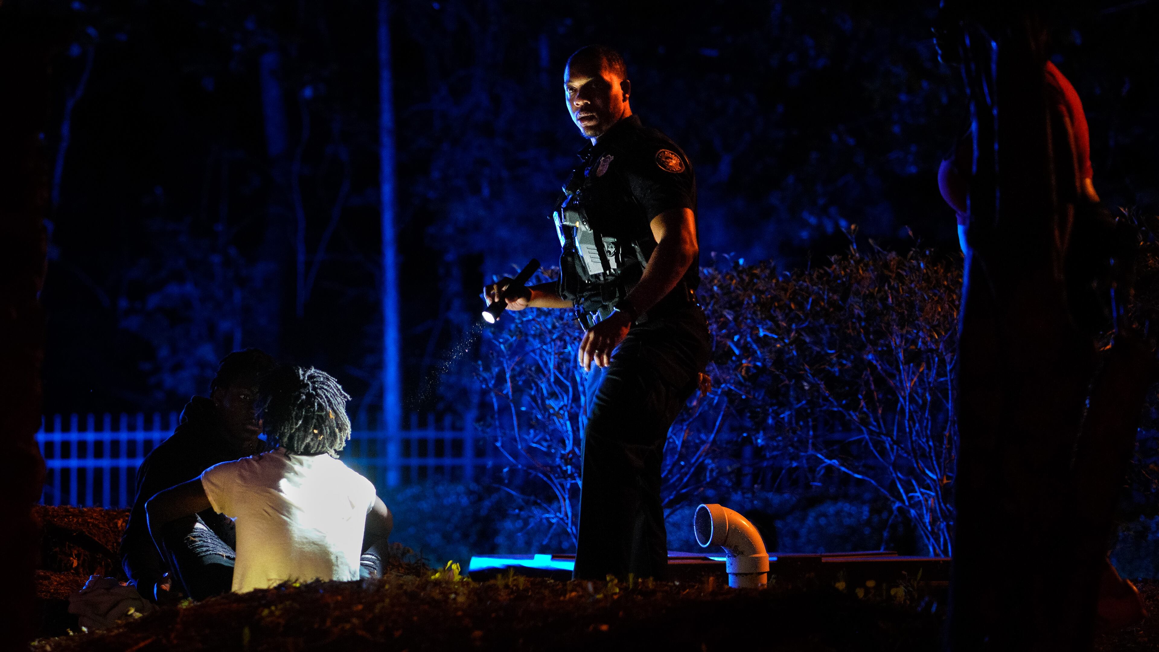 Atlanta police officers are seen on Benjamin E. Mays drive after a shooting early Sunday, May 28, 2023.