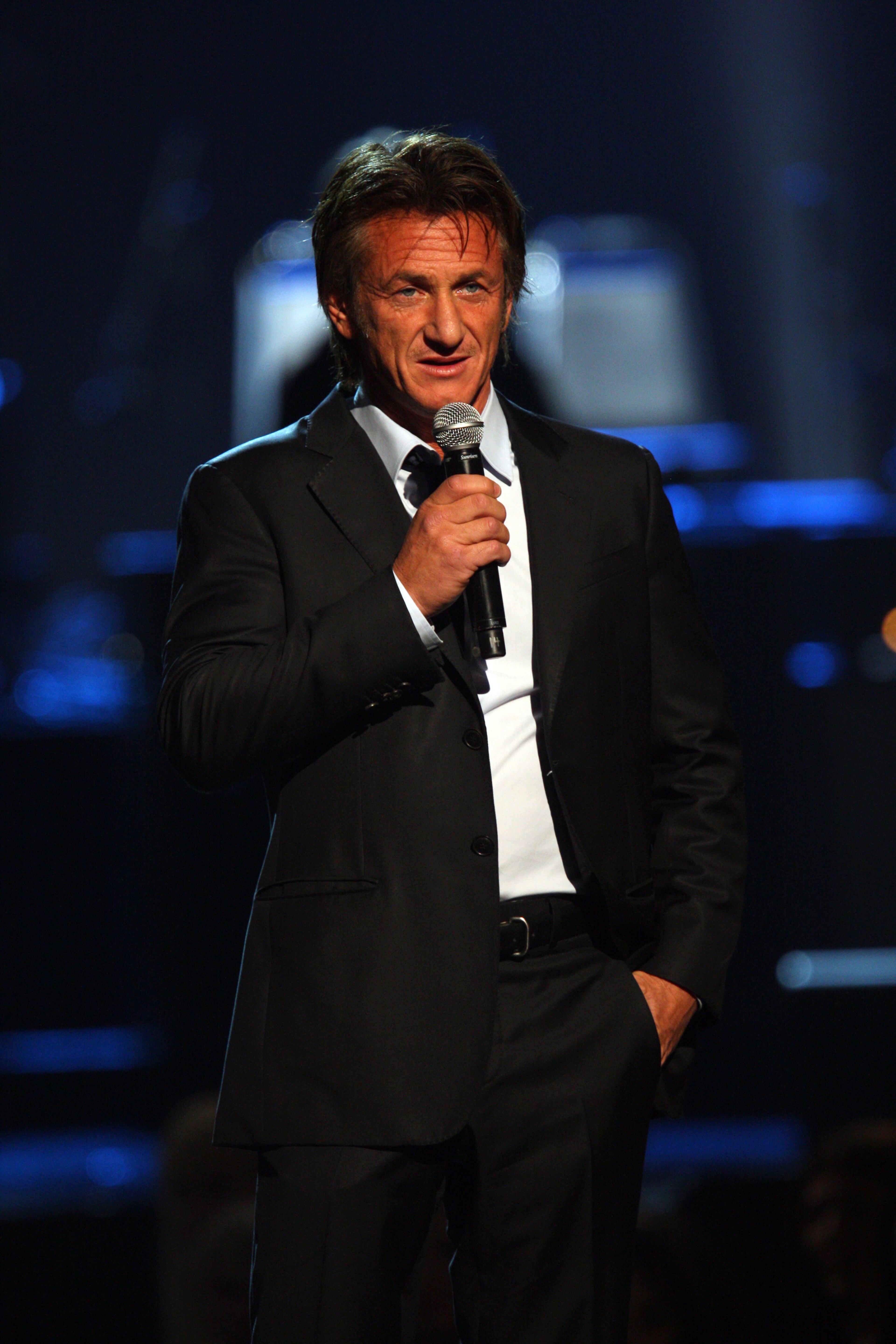 Sean Penn introduces Paul McCartney at The Night That Changed America: A Grammy Salute to the Beatles, on Monday, Jan. 27, 2014, in Los Angeles. (Photo by Zach Cordner/Invision/AP)