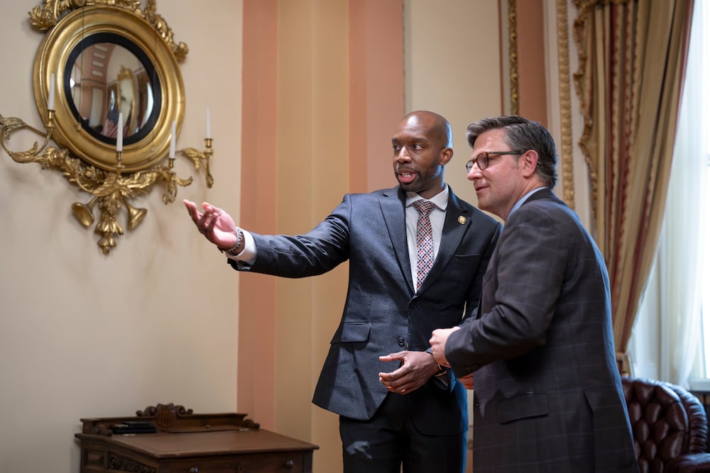 U.S. House Speaker Mike Johnson, right, greets new U.S. Rep. Everton Blair, D-Ga., at the Capitol in Washington last month. (J. Scott Applewhite/AP)
