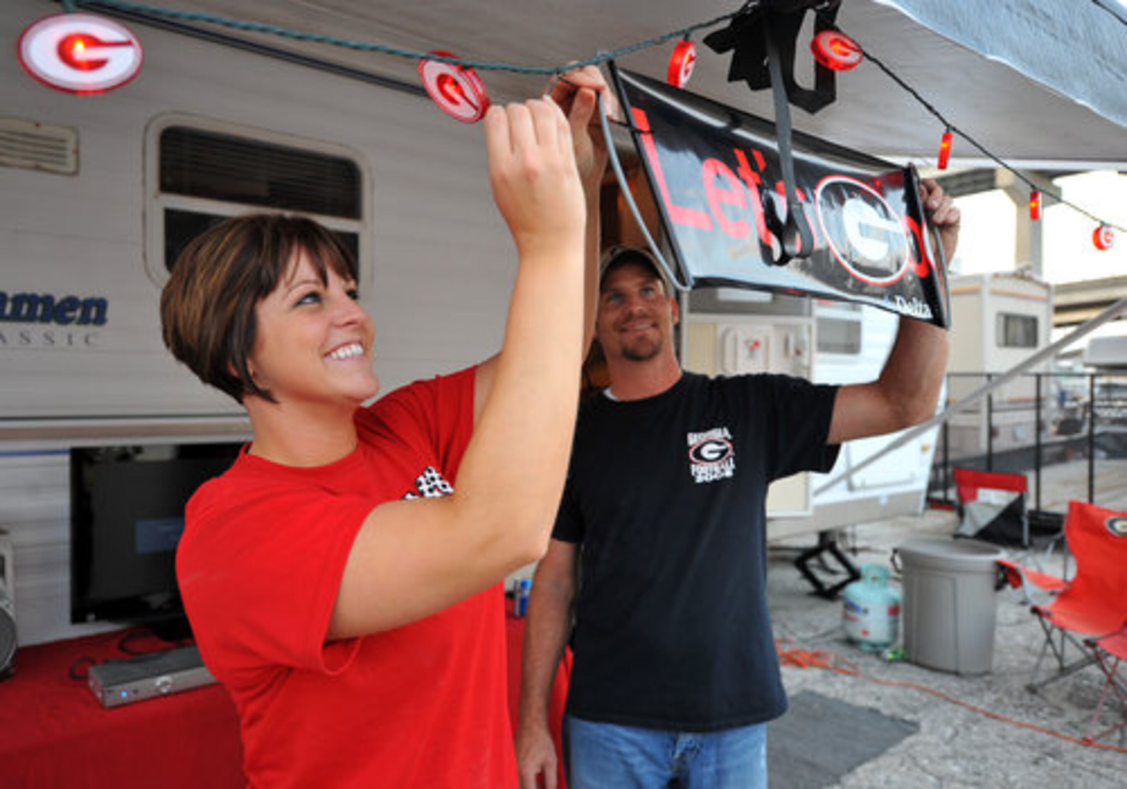 Crista Gibson and her husband, Steven Gibson, of Brunswick decorate their site.