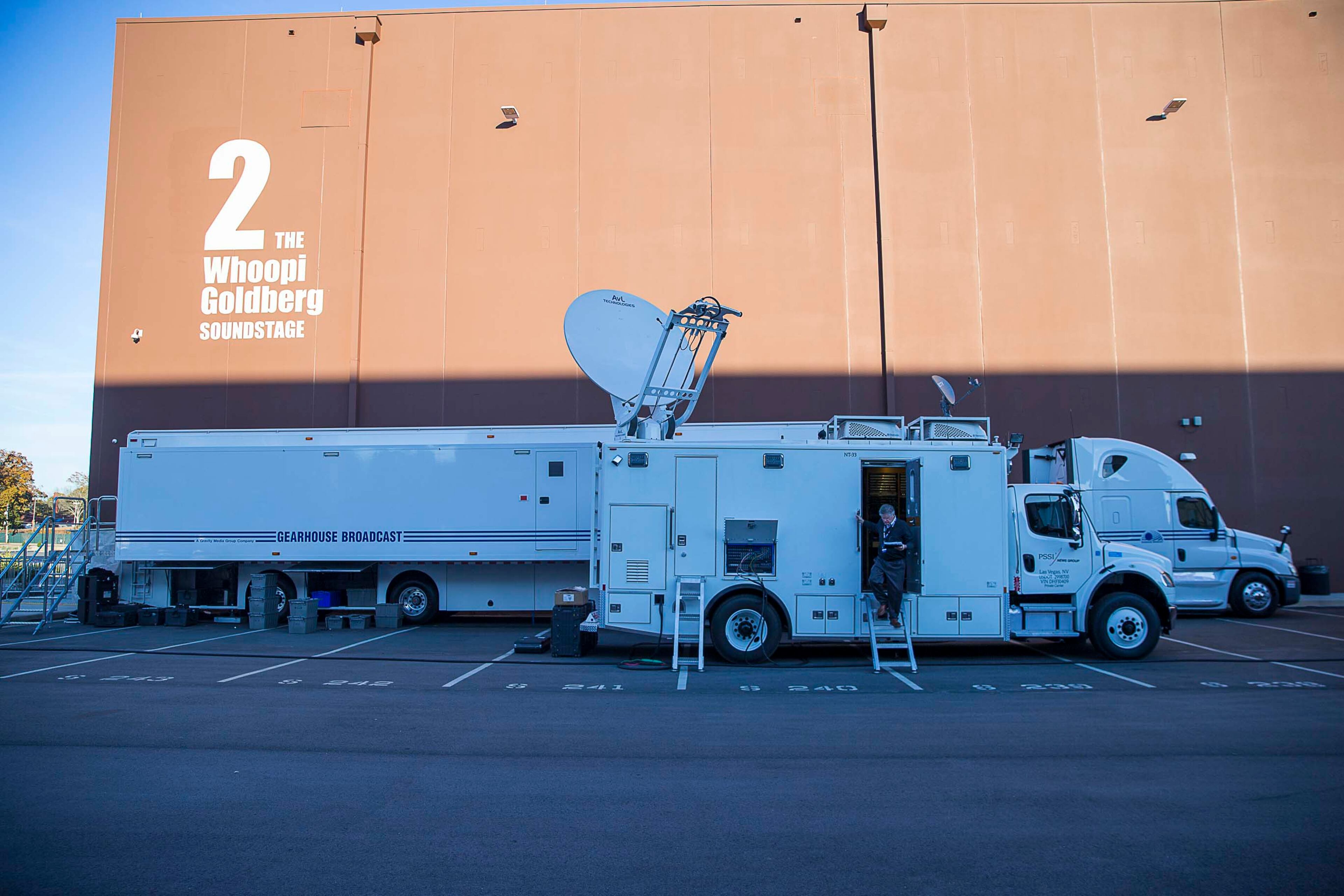 11/20/2019 -- Atlanta, Georgia -- Broadcast media satellite trucks are stationed in front of the Whoopi Goldberg soundstage inside Tyler Perry Studios in preparation for the MSNBC/The Washington Post Democratic Presidential debate in Atlanta, Monday, November 20, 2019. (Alyssa Pointer/Atlanta Journal Constitution)