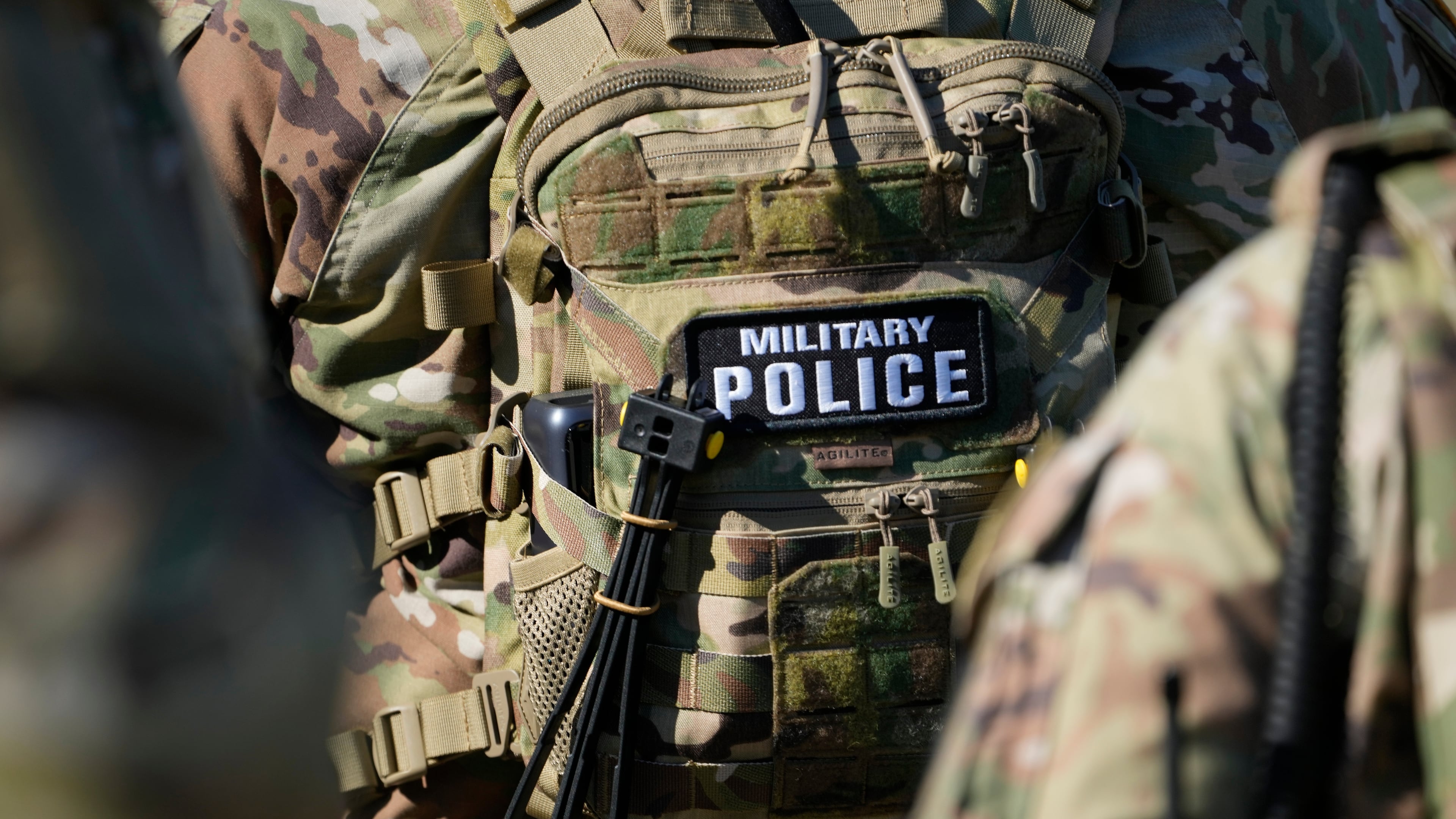 FILE - Members from the National Guard working as part of the Memphis Safe Task Force conduct a community safety patrol at Tom Lee Park, Oct. 12, 2025, in Memphis, Tenn. (AP Photo/George Walker IV, File)