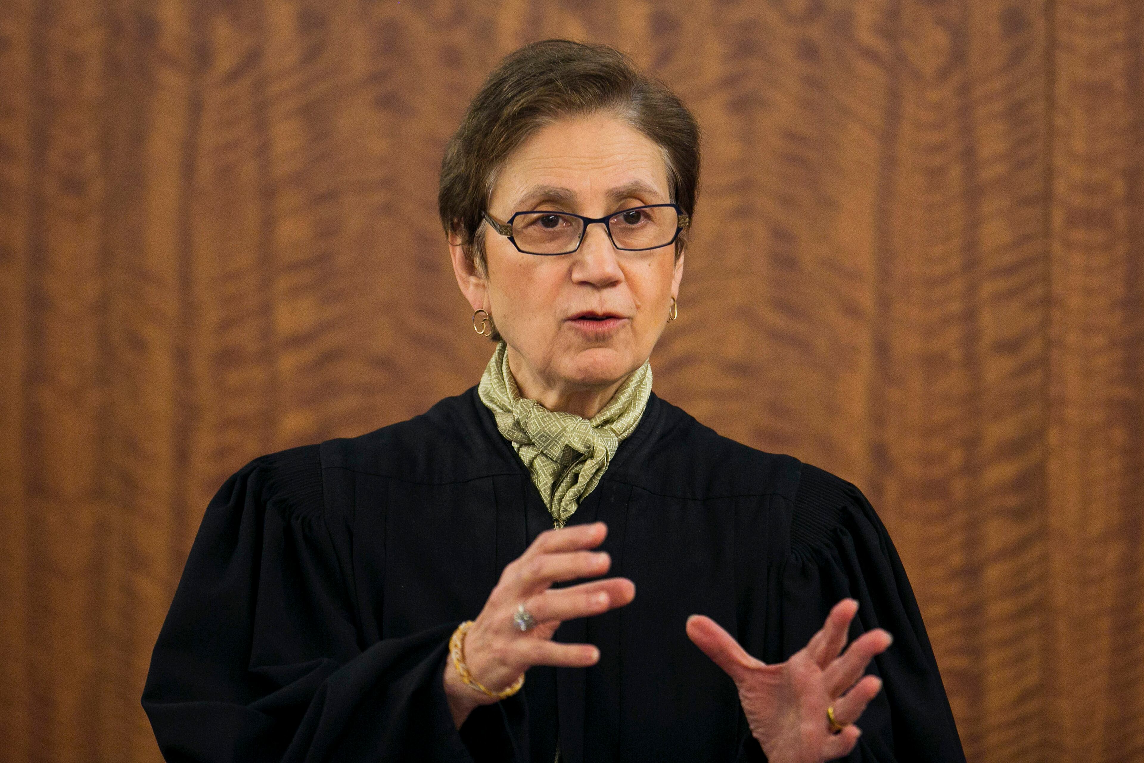 Judge E. Susan Garsh instructs the jury before they resume deliberations during the murder trial for former New England Patriots NFL football player Aaron Hernandez at the Bristol County Superior Court in Fall River, Mass., on Wednesday, April 15, 2015. Hernandez is accused of killing Odin Lloyd in June 2013. (Dominick Reuter/Pool Photo via AP)