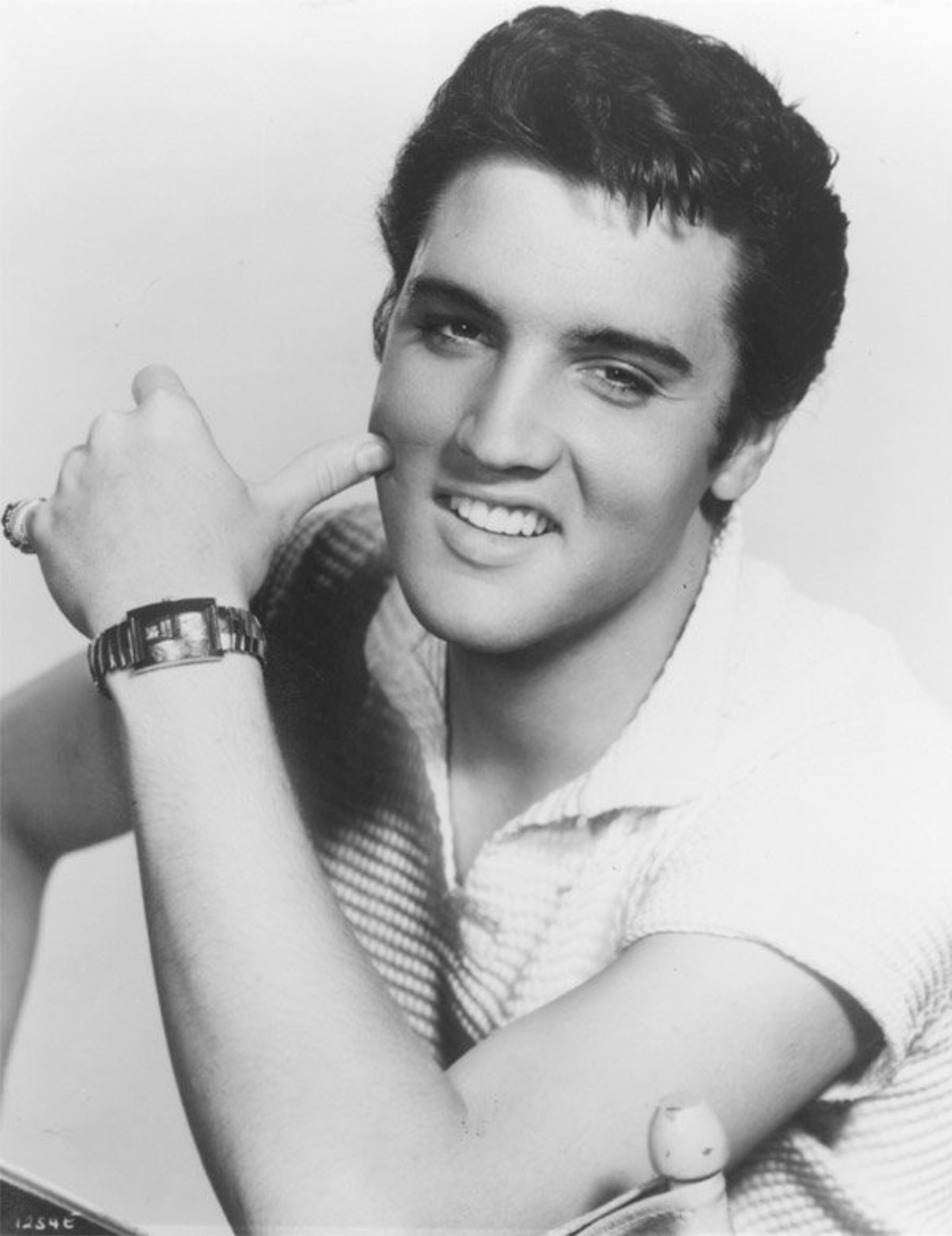 Elvis Presley, 1957, 22 years old. publicity photo taken year he bought & moved into graceland . Elvis Presley netted $37 million in the past year.