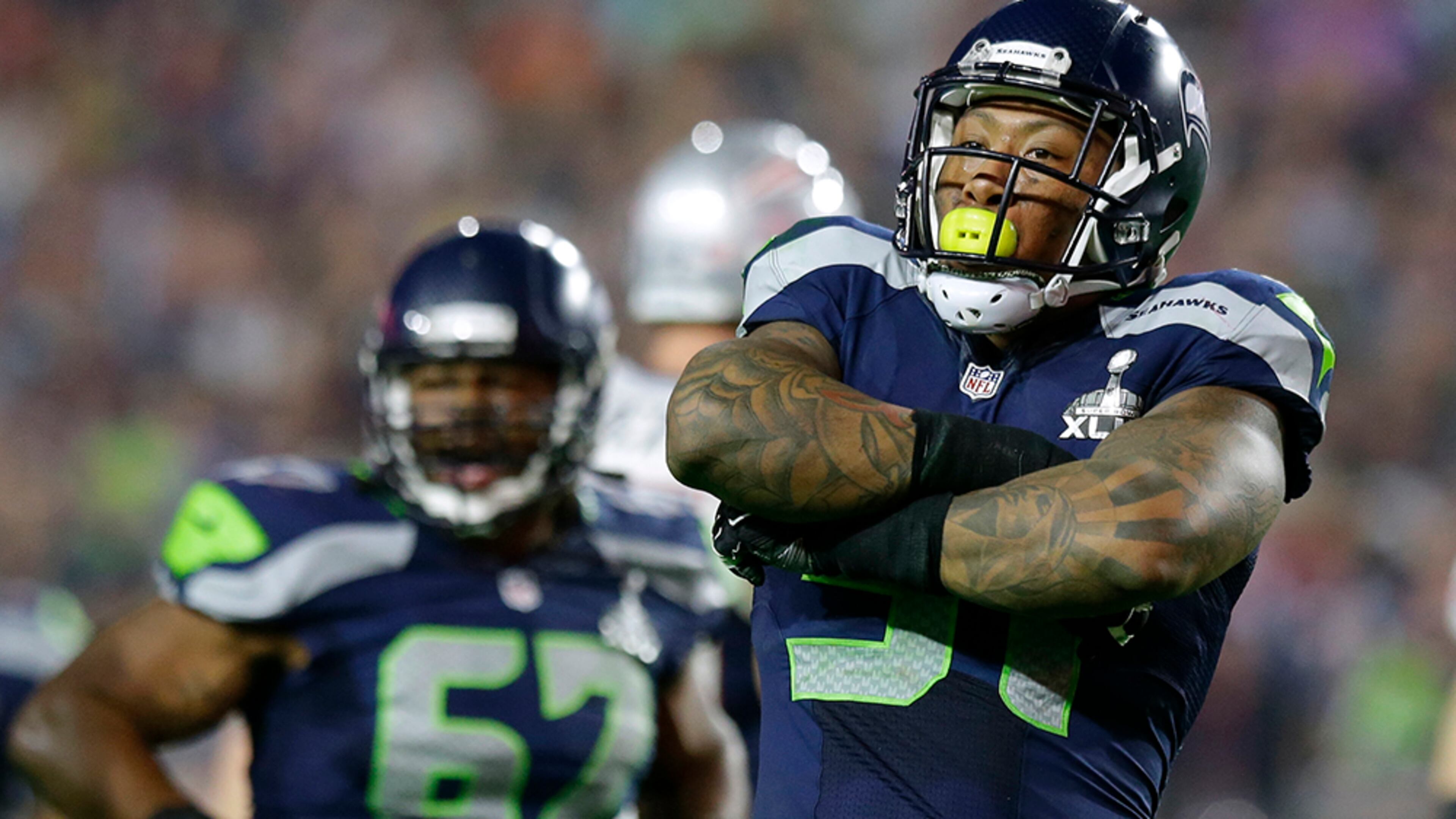 Seattle Seahawks outside linebacker Bruce Irvin (51) celebrates after sacking New England Patriots quarterback Tom Brady during the second half of NFL Super Bowl XLIX football game Sunday, Feb. 1, 2015, in Glendale, Ariz. (AP Photo/Michael Conroy) Once thought to be a risky first-round draft pick and a one-trick pony in the NFL that could only rush the passer, Seattle linebacker Bruce Irvin has developed into a defensive player that never leaves the field. (Michael Conroy / AP)