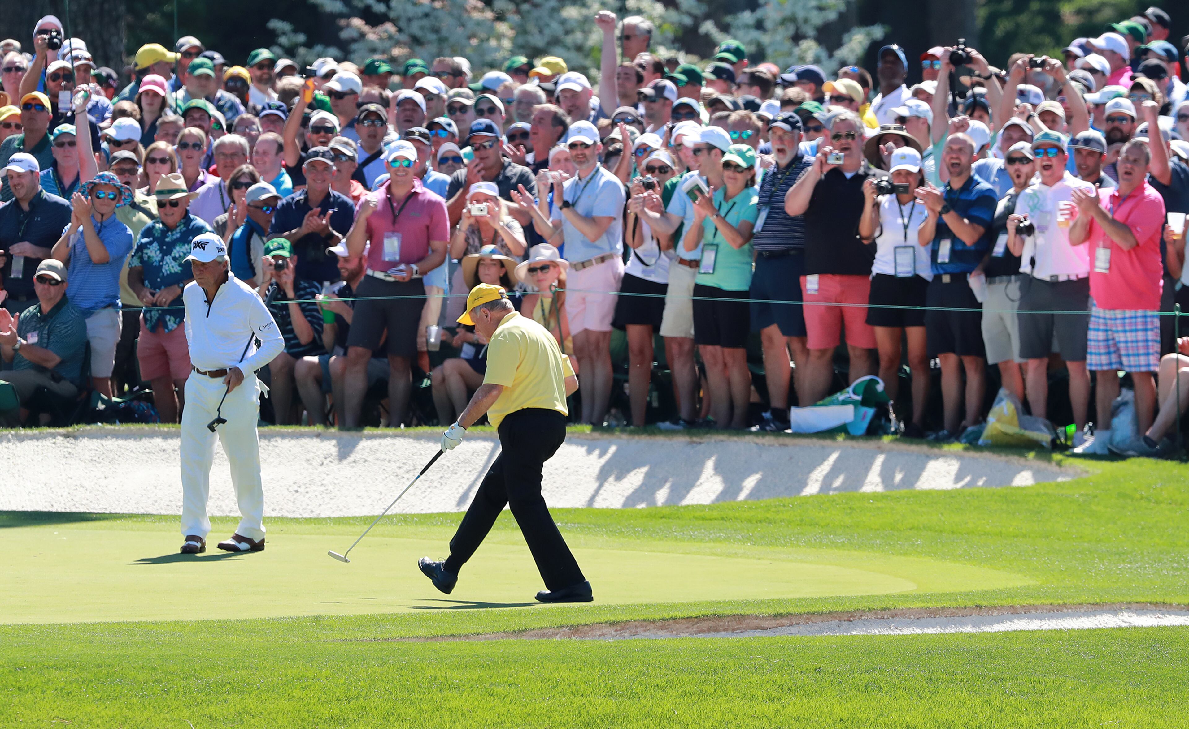 Jack Nicklaus makes a birdie putt on the sixth hole with Gary Player during the Masters Par -3 Contest at Augusta National Golf Club on Wednesday, April 10, 2019, in Augusta. The two will be the honorary starters to begin the tournament. Curtis Compton/ccompton@ajc.com