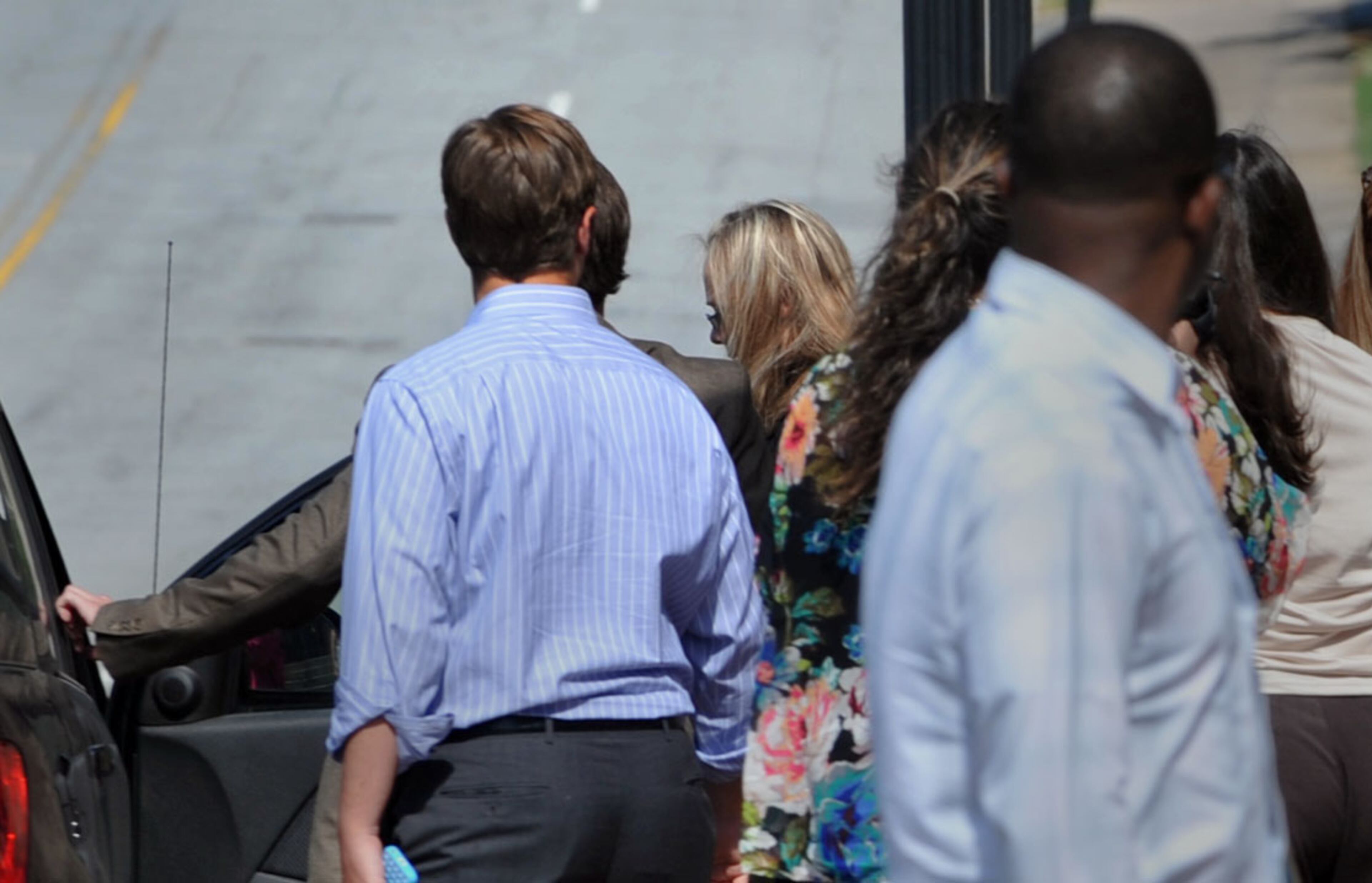 Leanna Harris, right, wife of Justin Ross Harris, the father of a toddler who died after police say he was left in a hot car for about seven hours, arrives for her husband's bond hearing in Cobb County Magistrate Court, Thursday, July 3, 2014, in Marietta, Ga. Harris is facing charges of second-degree cruelty to a child and felony murder in the death of his 22 month-old son Cooper on June 18, 2014. JOHNSON/KDJOHNSON@AJC.COM