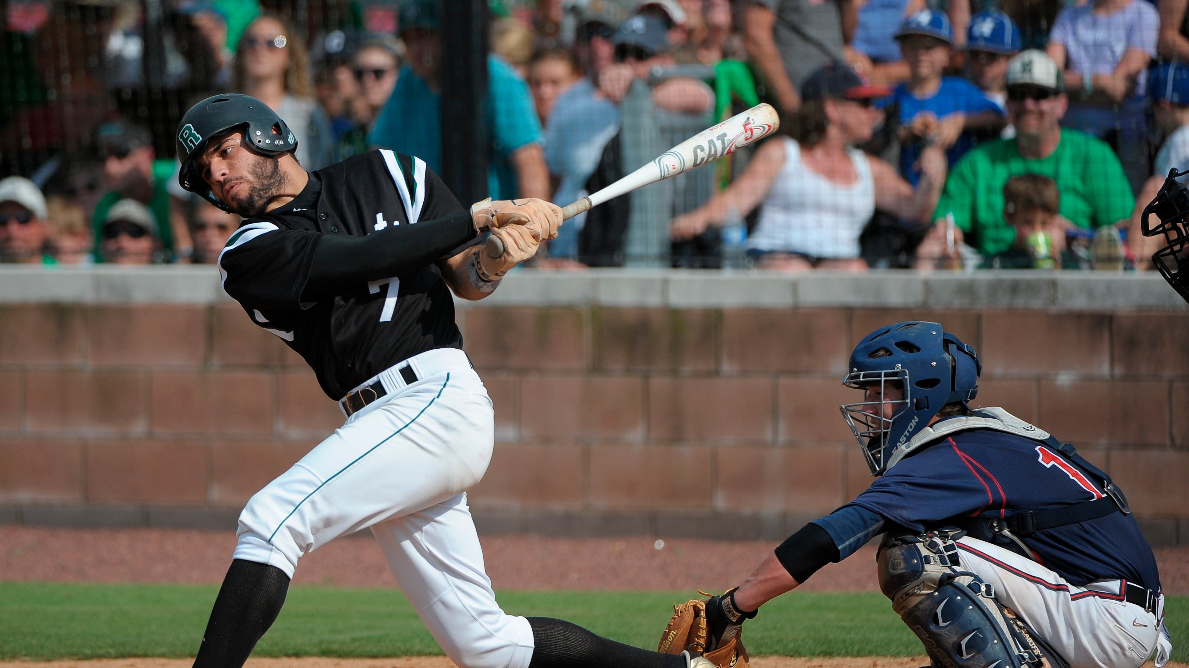Roswell batter Adam Terrinoni strikes out swinging to end the sixth inning of their GHSA AAAAAA State Baseball Championship game against Milton, Monday, May 27, 2013, in Milton, Ga. David Tulis / AJC Special