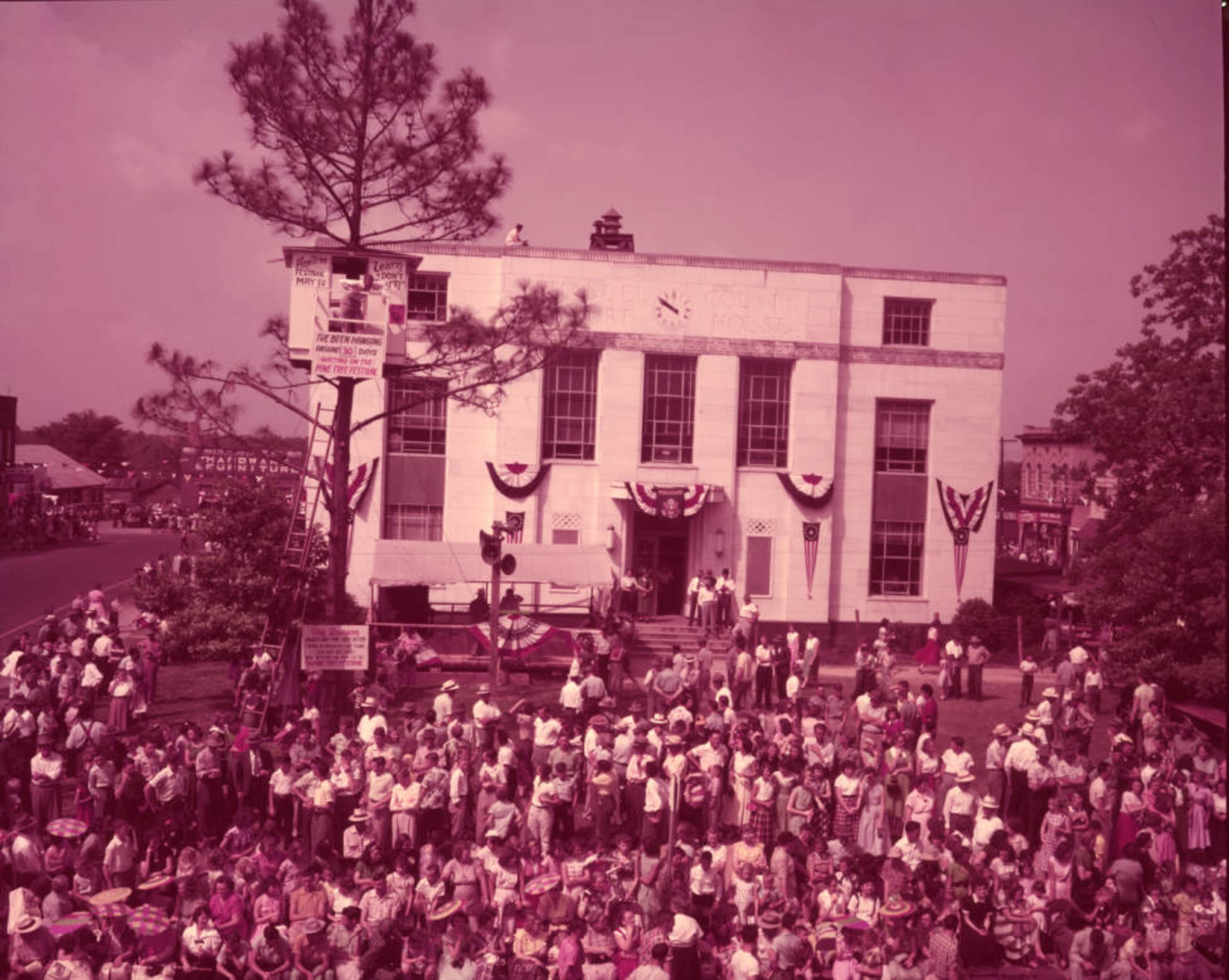 Residents line the street at Swainsboro's annual Pine Tree Festival in 1953. Guy Hayes/AJC