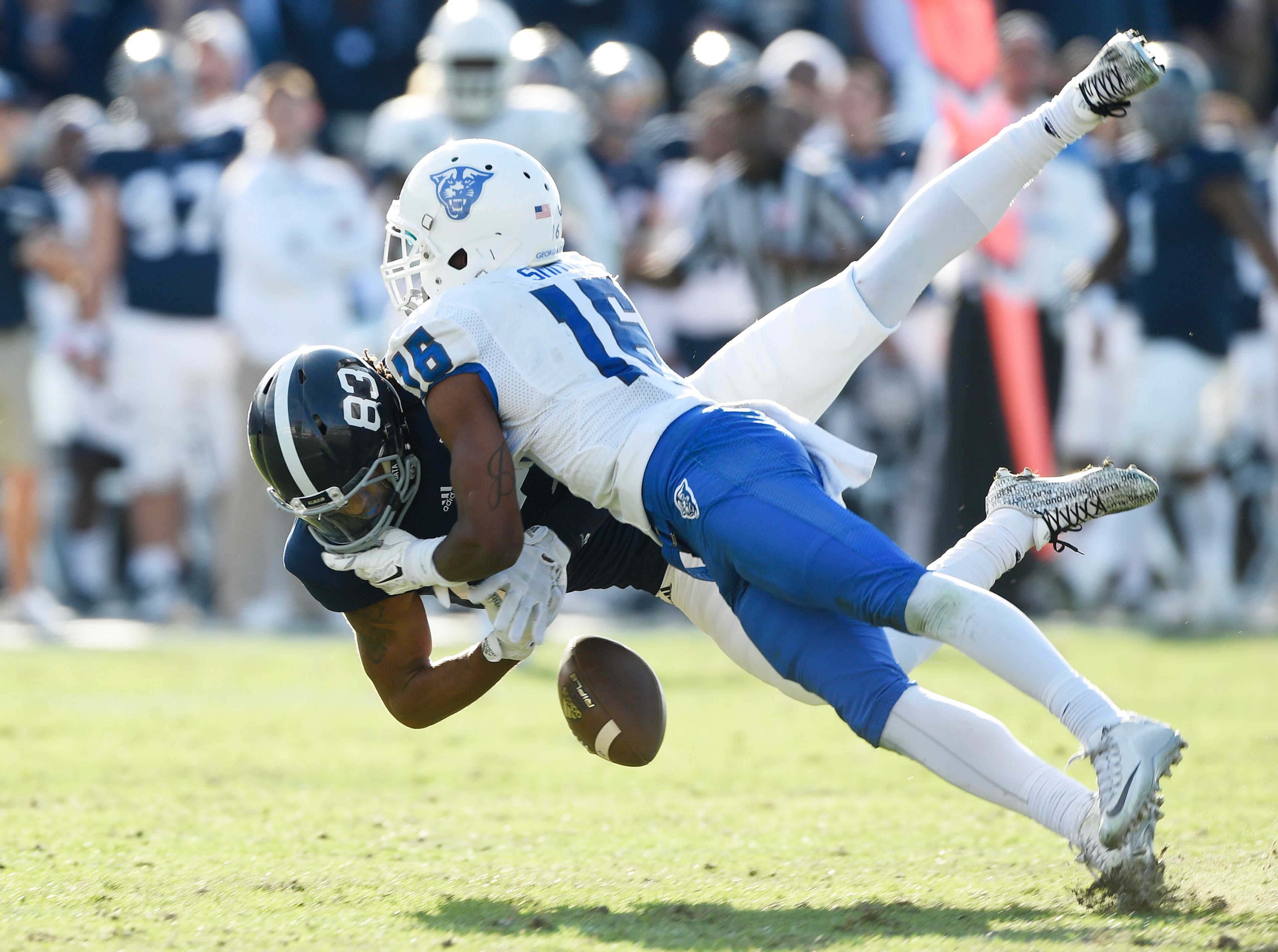 Wide receiver Keigan Williams #83 of the Georgia Southern Eagles has a reception broken up by cornerback Jerome Smith #16 of the Georgia State Panthers during the second quarter on December 5, 2015 at Paulson Stadium in Statesboro, Georgia.