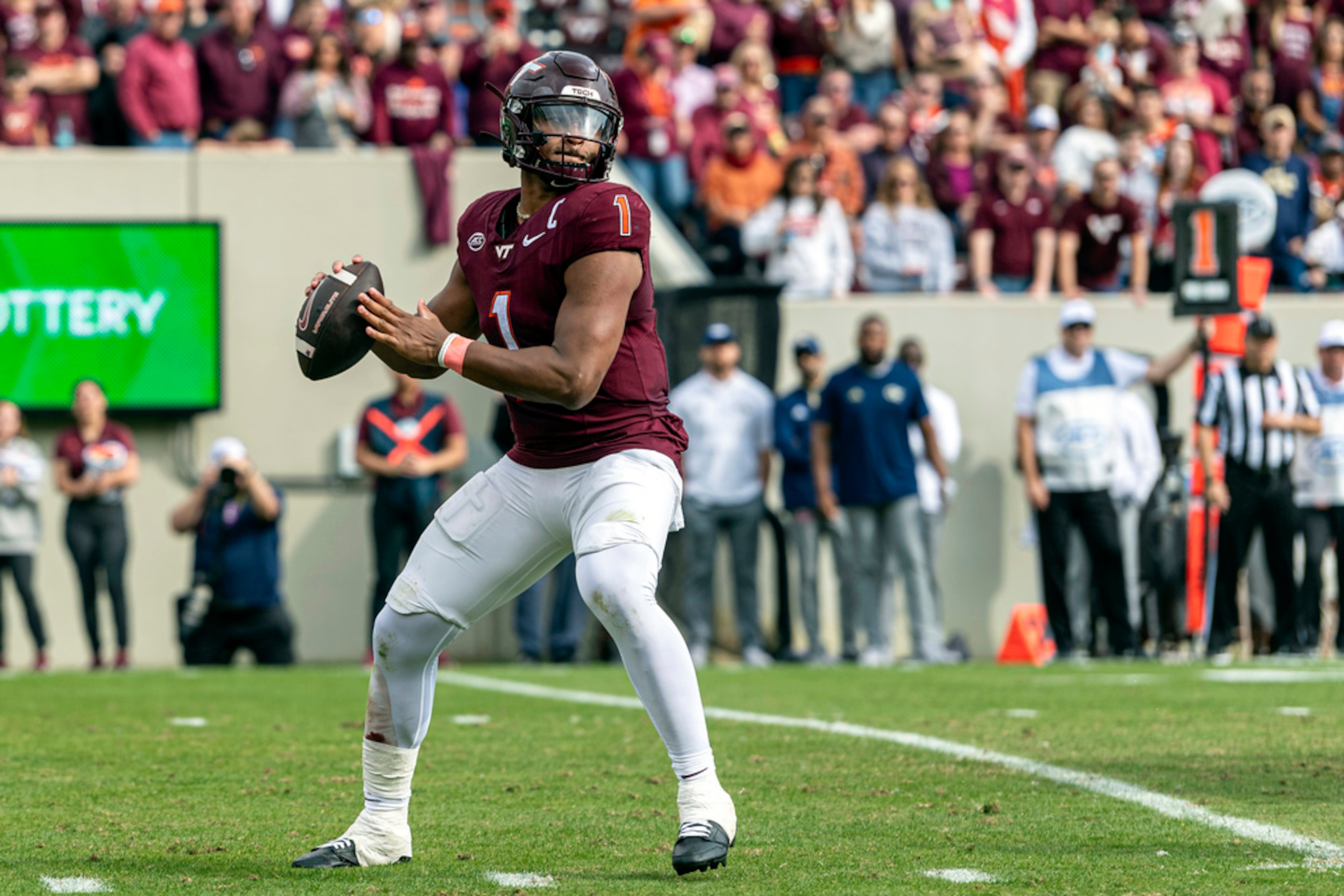 Virginia Tech's Kyron Drones (1) sets up to throw downfield against Georgia Tech during the second half of an NCAA college football game, Saturday, Oct. 26, 2024, in Blacksburg, Va. (AP Photo/Robert Simmons)