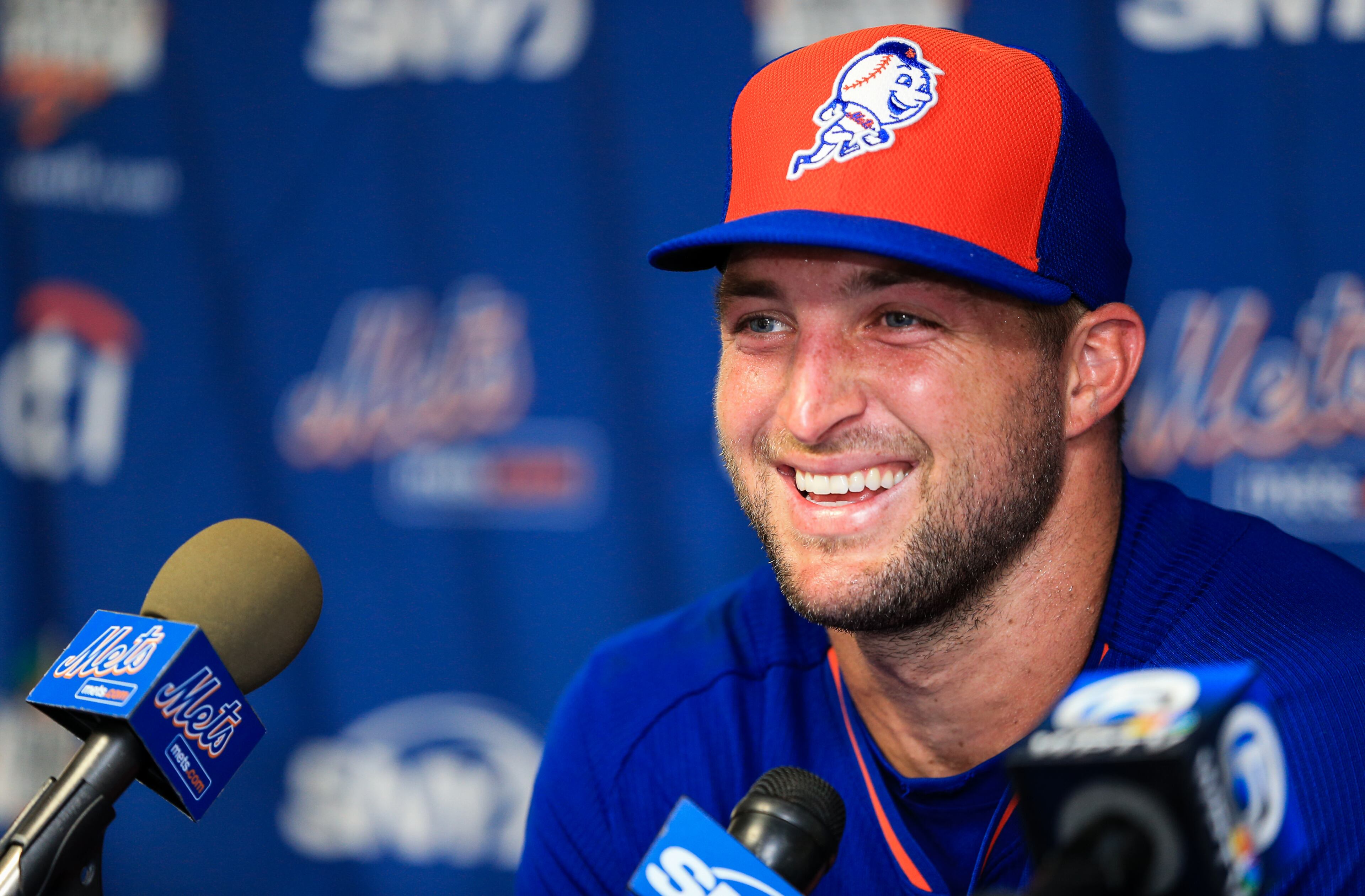 Tim Tebow of the New York Mets speaks at a press conference after a work out. (Photo by Rob Foldy/Getty Images)