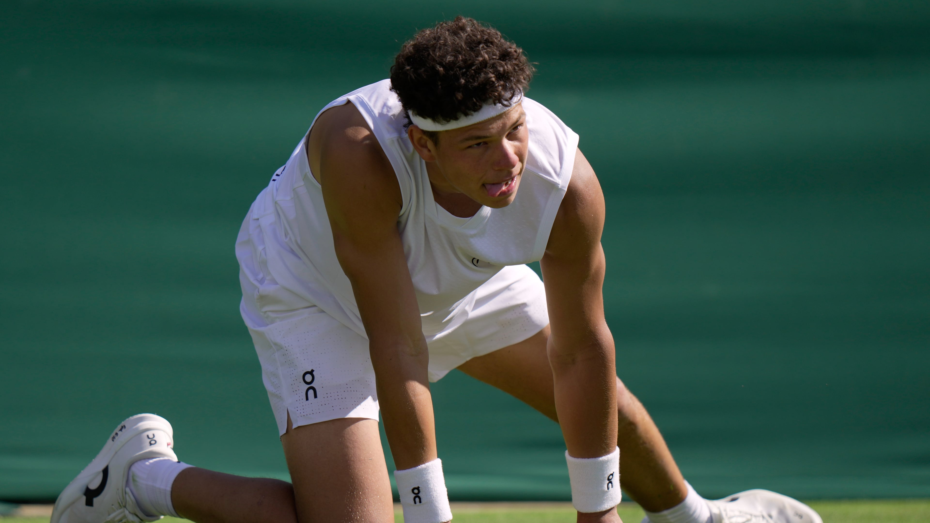 Ben Shelton of the United States reacts as he plays Otto Virtanen of Finland during their men's singles match at the Wimbledon Tennis Championships in London, Tuesday, June 30, 2026.(AP Photo/Brian Inganga)