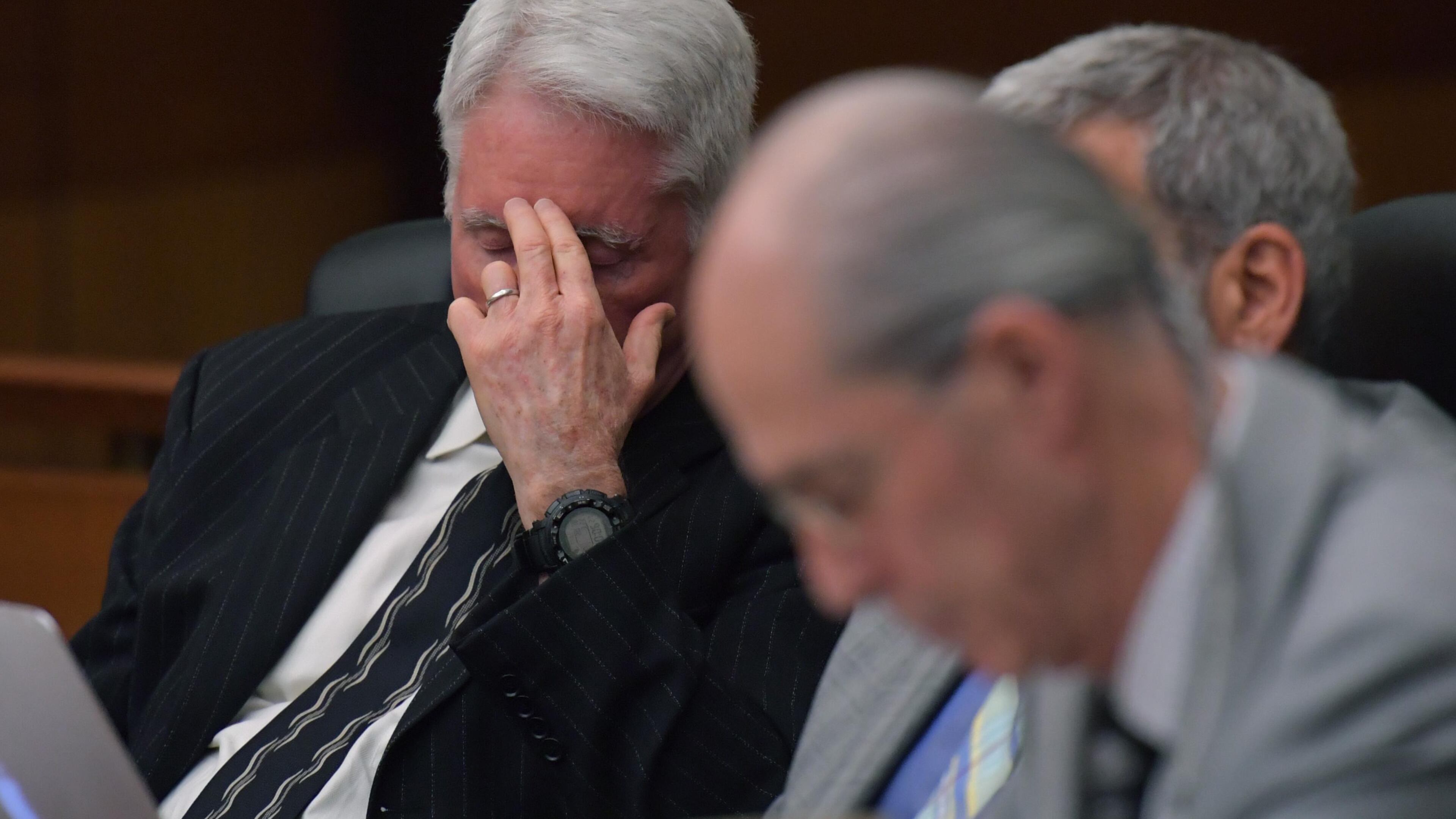 March 22, 2018 Atlanta - Tex McIver (left) reacts as he sits with his defense attorneys during Day 8 of the Tex McIver murder trial at Fulton County Courthouse on Thursday, March 22, 2018. HYOSUB SHIN / HSHIN@AJC.COM