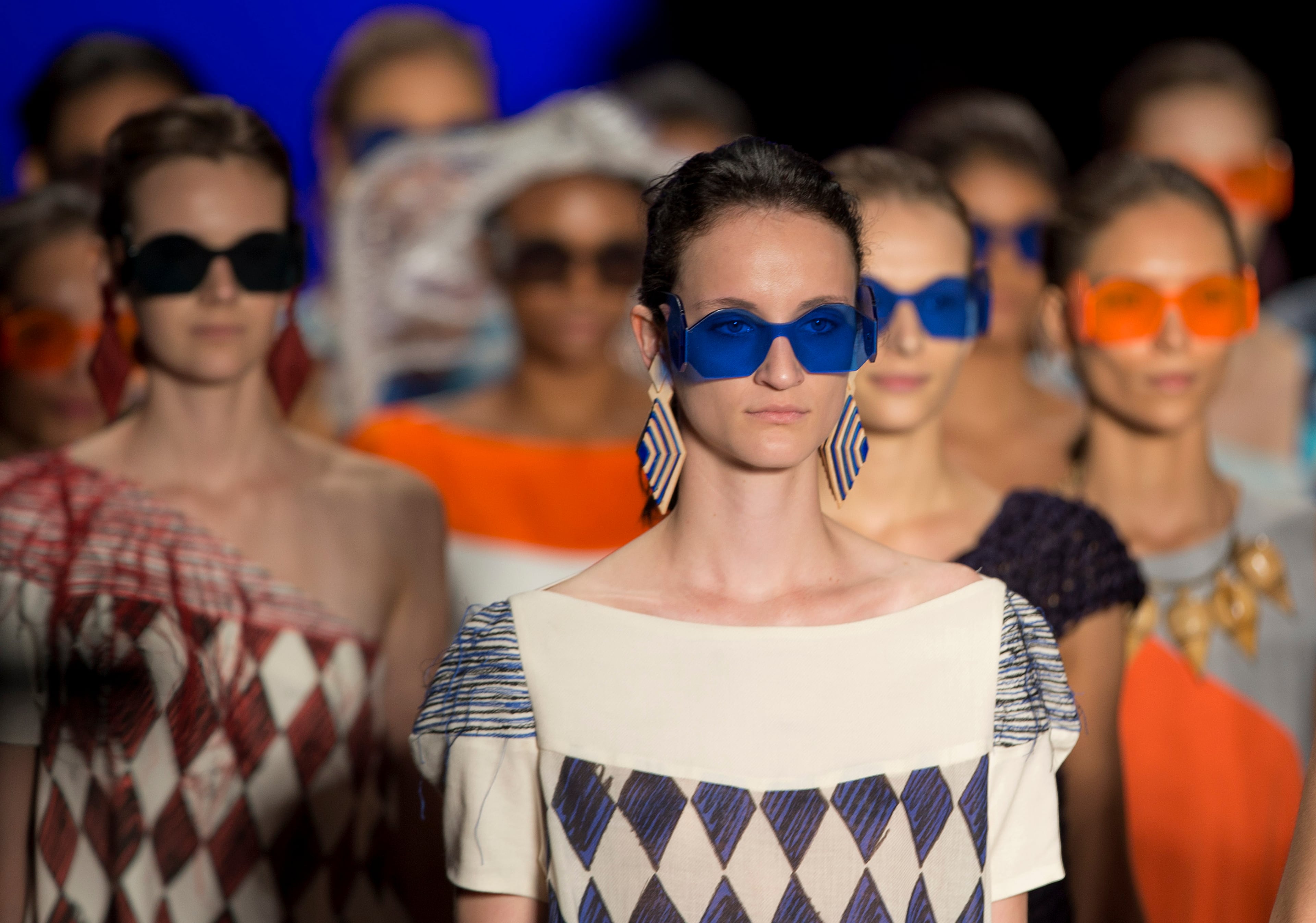 Models wear creations from the Ronaldo Fraga Summer collection during the Sao Paulo Fashion Week in Sao Paulo, Brazil, Wednesday, April 2, 2014.