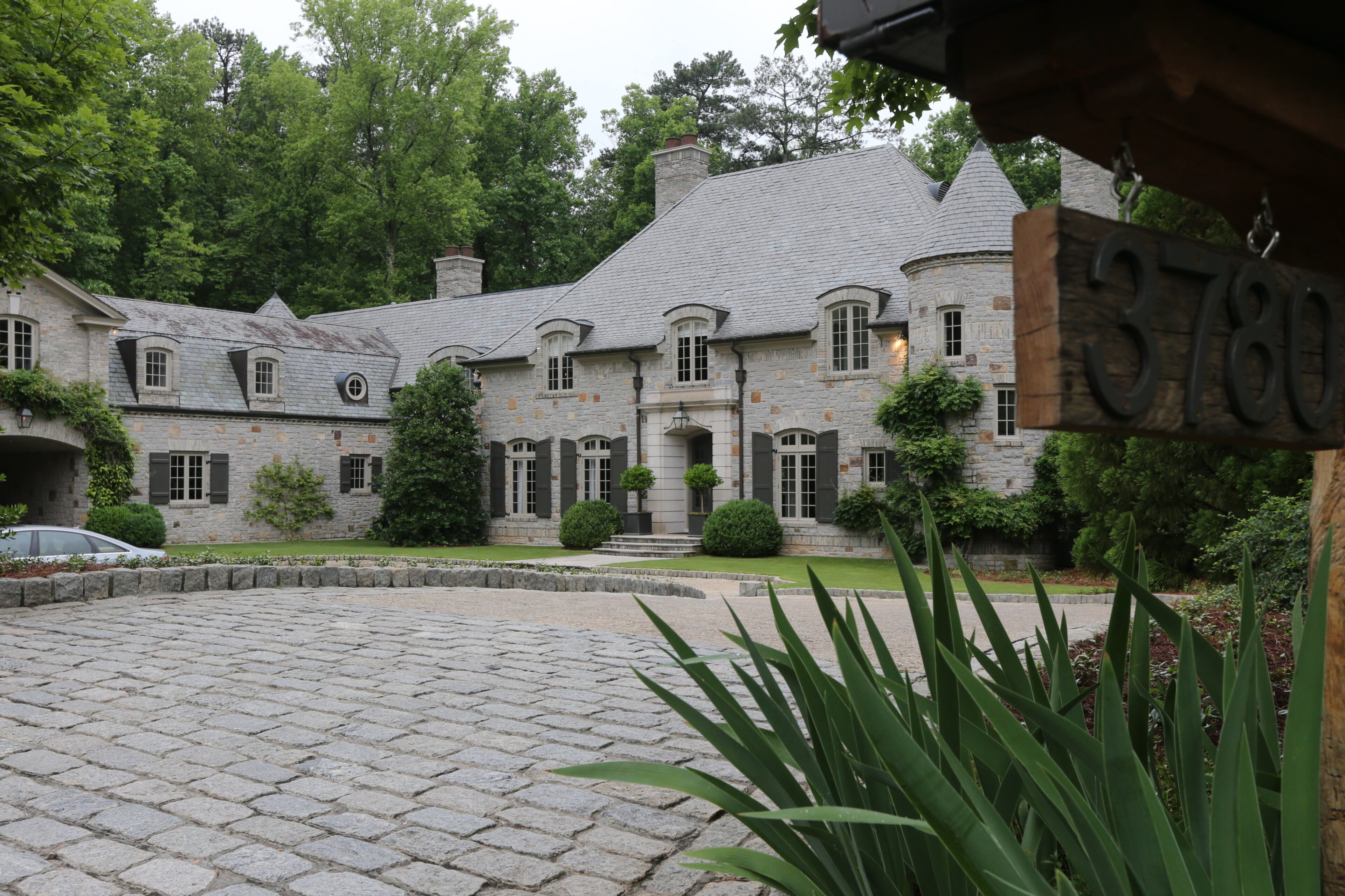 Atlanta police Tuesday, May 26, 2015, were investigating an overnight robbery at a Buckhead mansion in which one of the victims was kidnapped and forced to withdraw cash from an ATM.