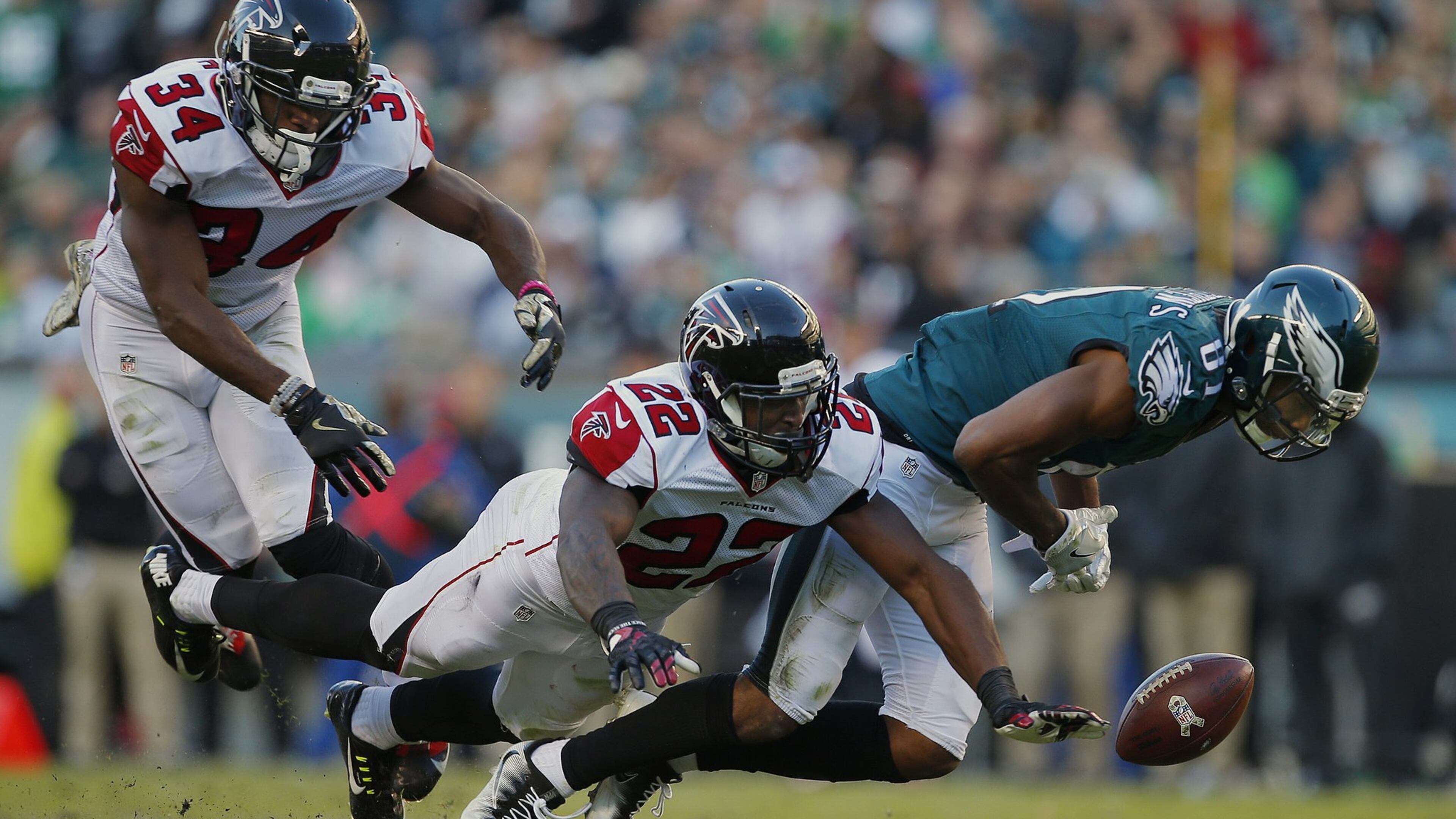 PHILADELPHIA, PA - NOVEMBER 13: Jordan Matthews #81 of the Philadelphia Eagles looses control of the ball as he is hit by Keanu Neal #22 of the Atlanta Falcons in the third quarter during a game at Lincoln Financial Field on November 13, 2016 in Philadelphia, Pennsylvania. The Eagles defeated the Falcons 24-15. (Photo by Rich Schultz/Getty Images)