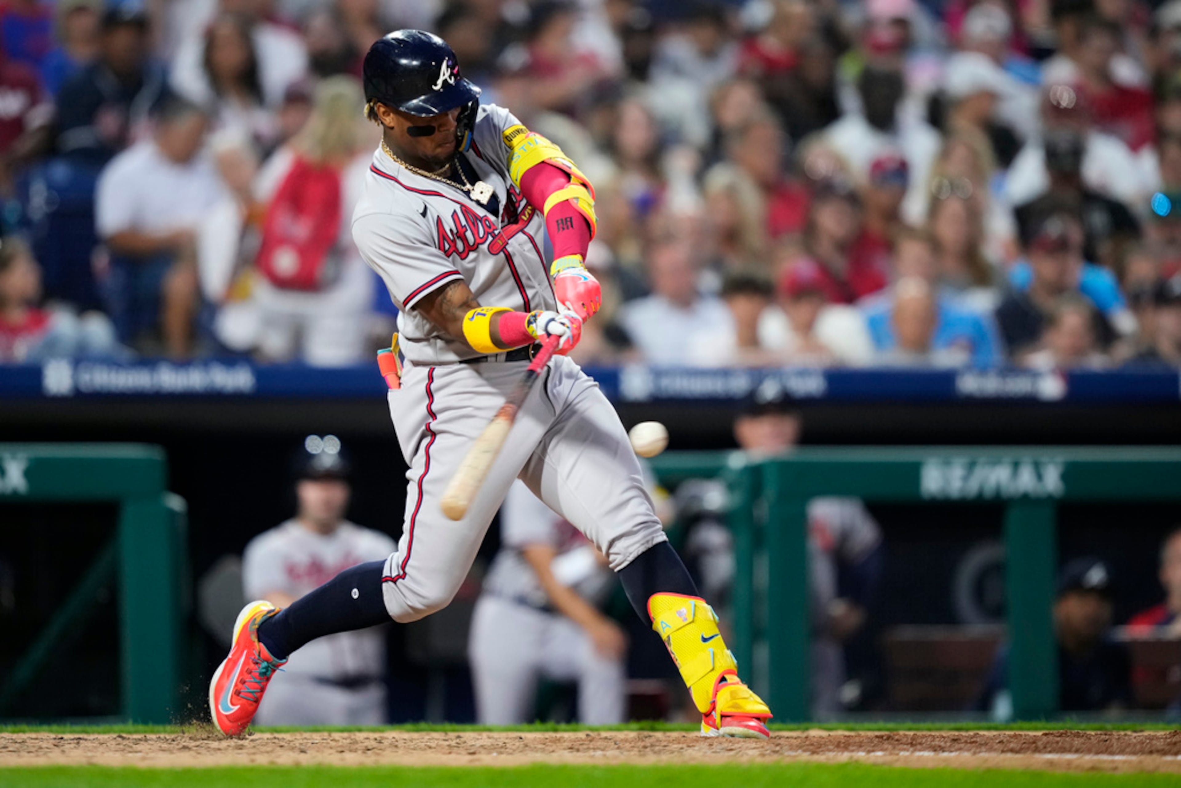 Atlanta Braves' Ronald Acuna Jr. hits a run-scoring single against Philadelphia Phillies pitcher Jeff Hoffman during the seventh inning of a baseball game, Tuesday, June 20, 2023, in Philadelphia. (AP Photo/Matt Slocum)