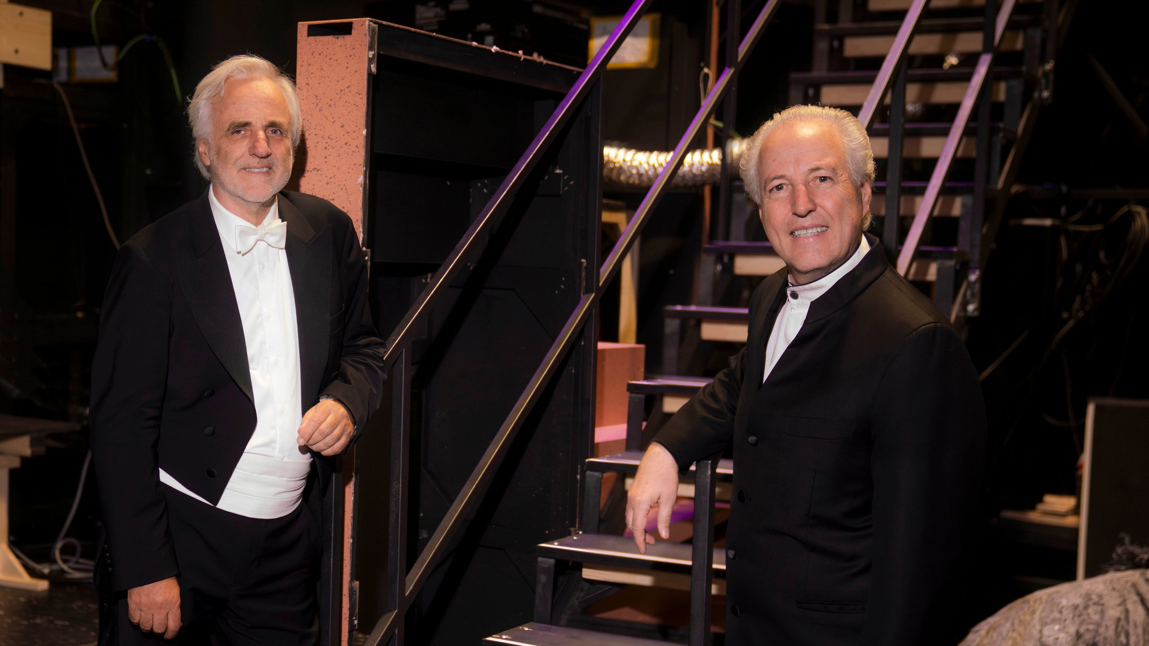 Manfred Honeck, conductor of the Vienna Philharmonic Orchestra and music director of the Pittsburgh Symphony Orchestra, right, appears with his brother Rainer Honeck, concertmaster of the Vienna Philharmonic Orchestra, as the two worked together on a production of Richard Strauss’ “Ariadne auf Naxos" at the Salzburg Festival in Salzburg, Austria on Aug. 7, 2026. (Marco Borrelli/Salzburg Festival via AP)