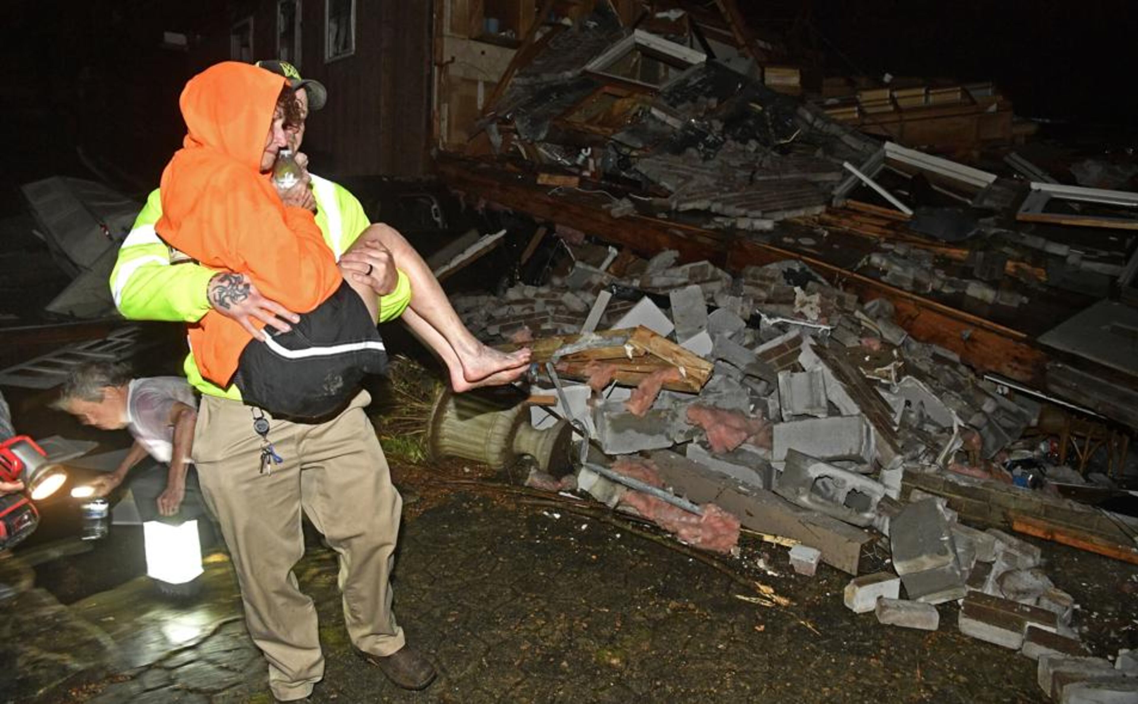 Tornadoes ripped across Tennessee early Tuesday, shredding at least 40 buildings and killing at least eight people. One of the twisters caused severe damage in downtown Nashville.