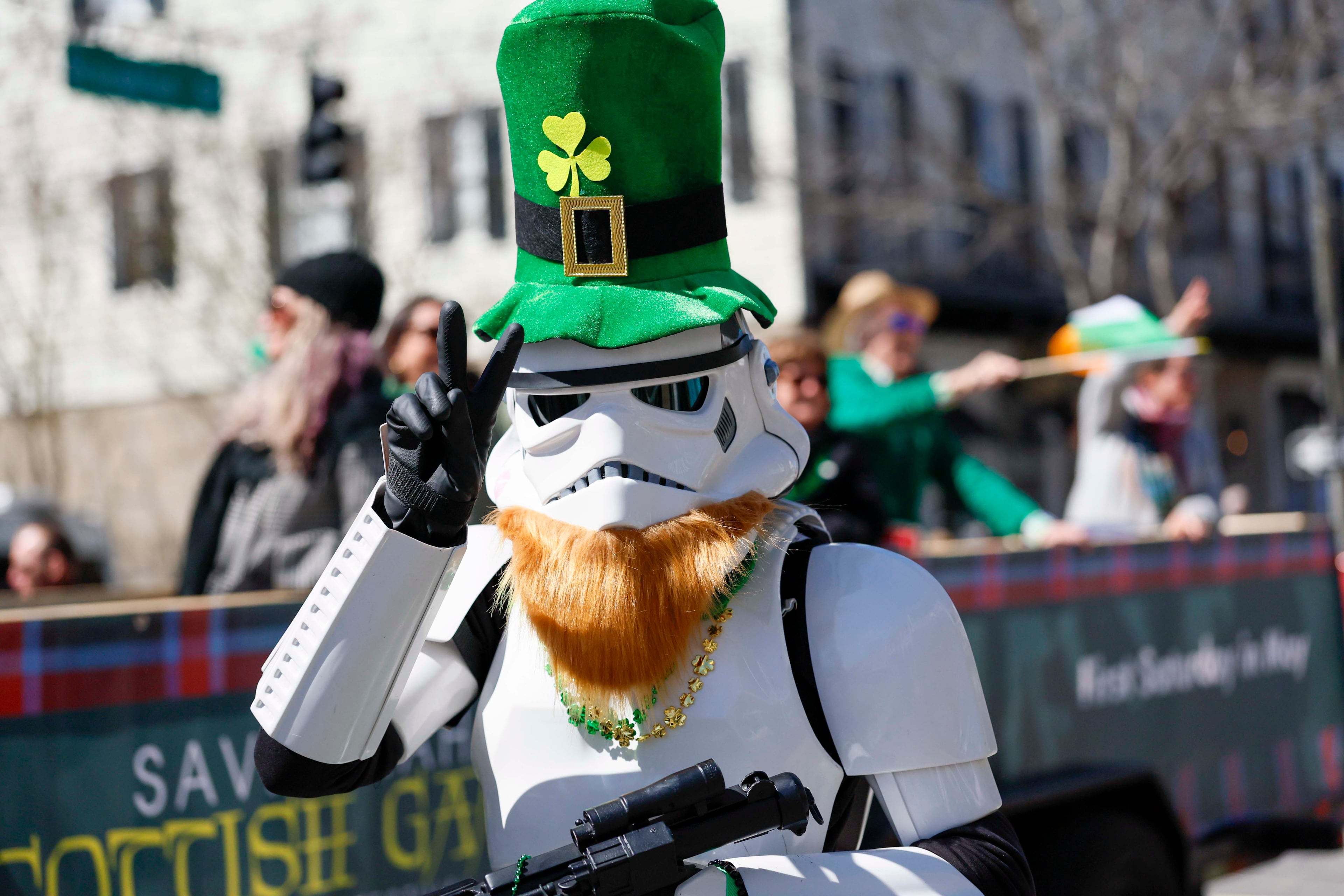 A "Star Wars" stormtrooper joins the fun with a beard and a hat for the St. Patrick’s Day celebration in Savannah on Tuesday, March 17, 2026. (Miguel Martinez/AJC)