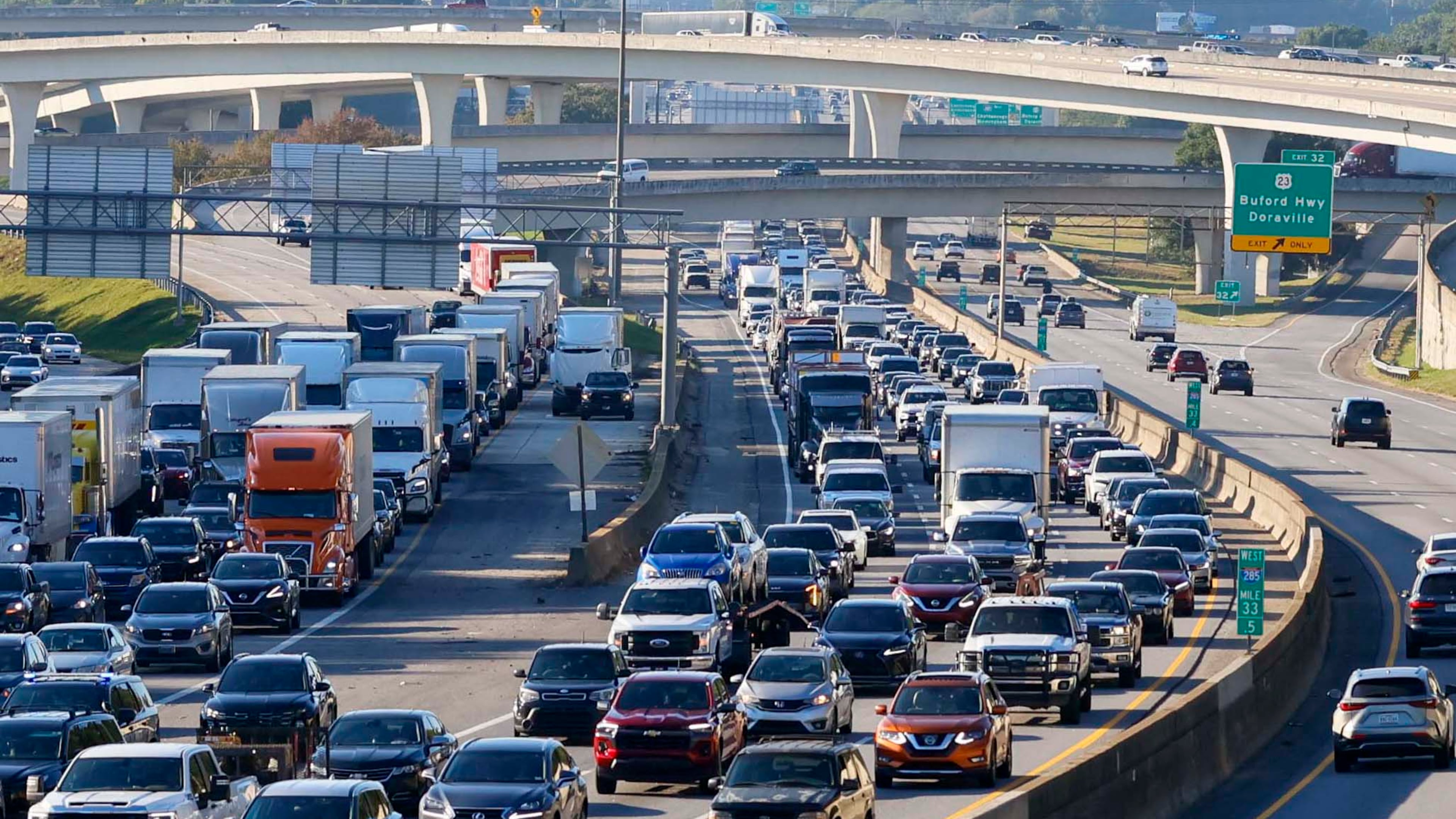 Heavy traffic is visible on I-285 near Chamblee Tucker Road on Oct. 13, 2026. GDOT is proceeding with a project to add toll lanes along the eastern portion of I-285. The 19-mile project is expected to remain under construction until 2042. (Miguel Martinez/AJC)