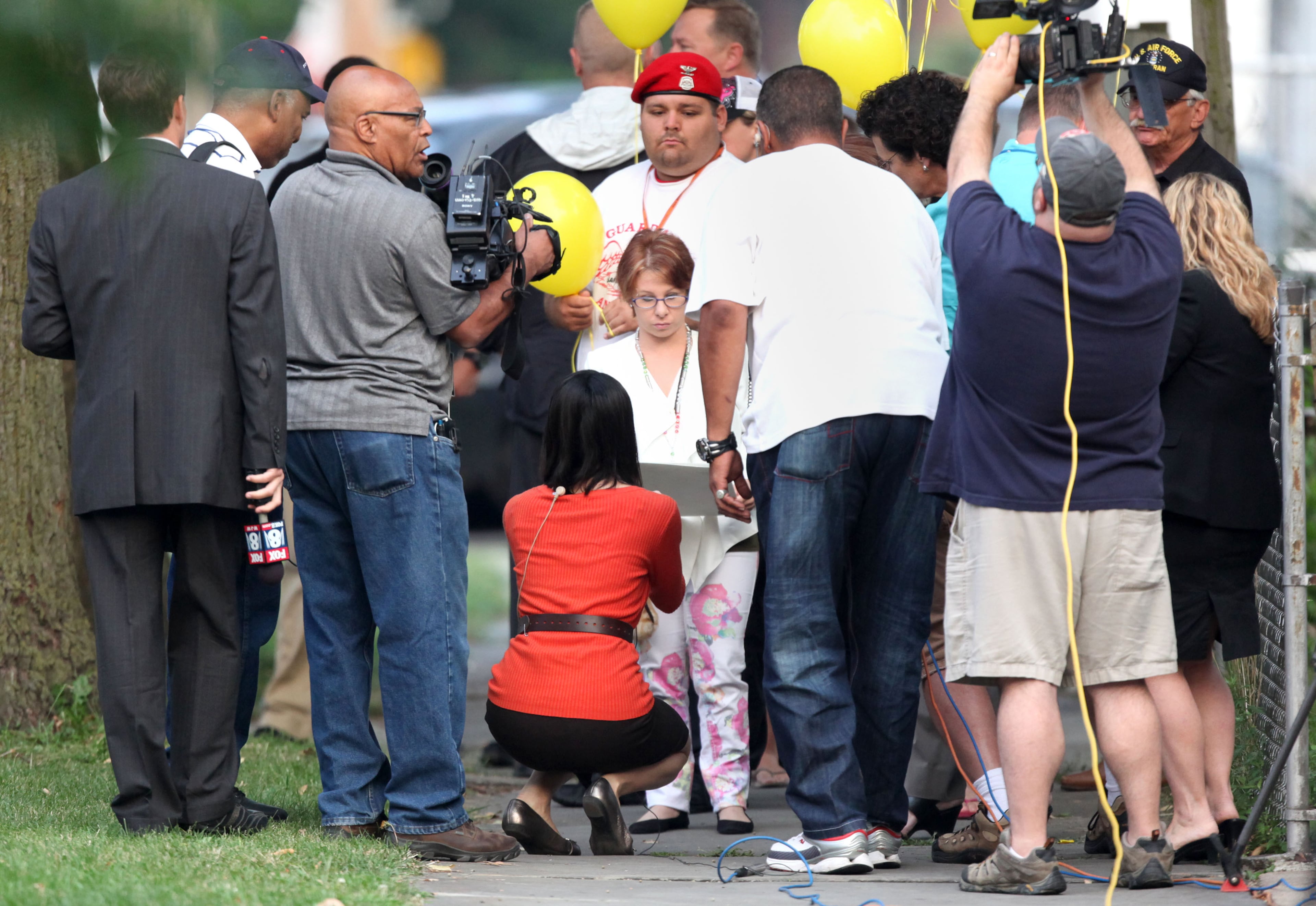 Michelle Knight arrives at Ariel Castro's home in Cleveland, Wednesday, Aug. 7, 2013. Castro held Knight, Amanda Berry and Gina DeJesus, captive for nearly a decade at this property. The house was torn down as part of a deal that spared Ariel Castro a possible death sentence. He was sentenced last week to life in prison plus 1,000 years. (AP Photo/The Plain Dealer, Marvin Fong)