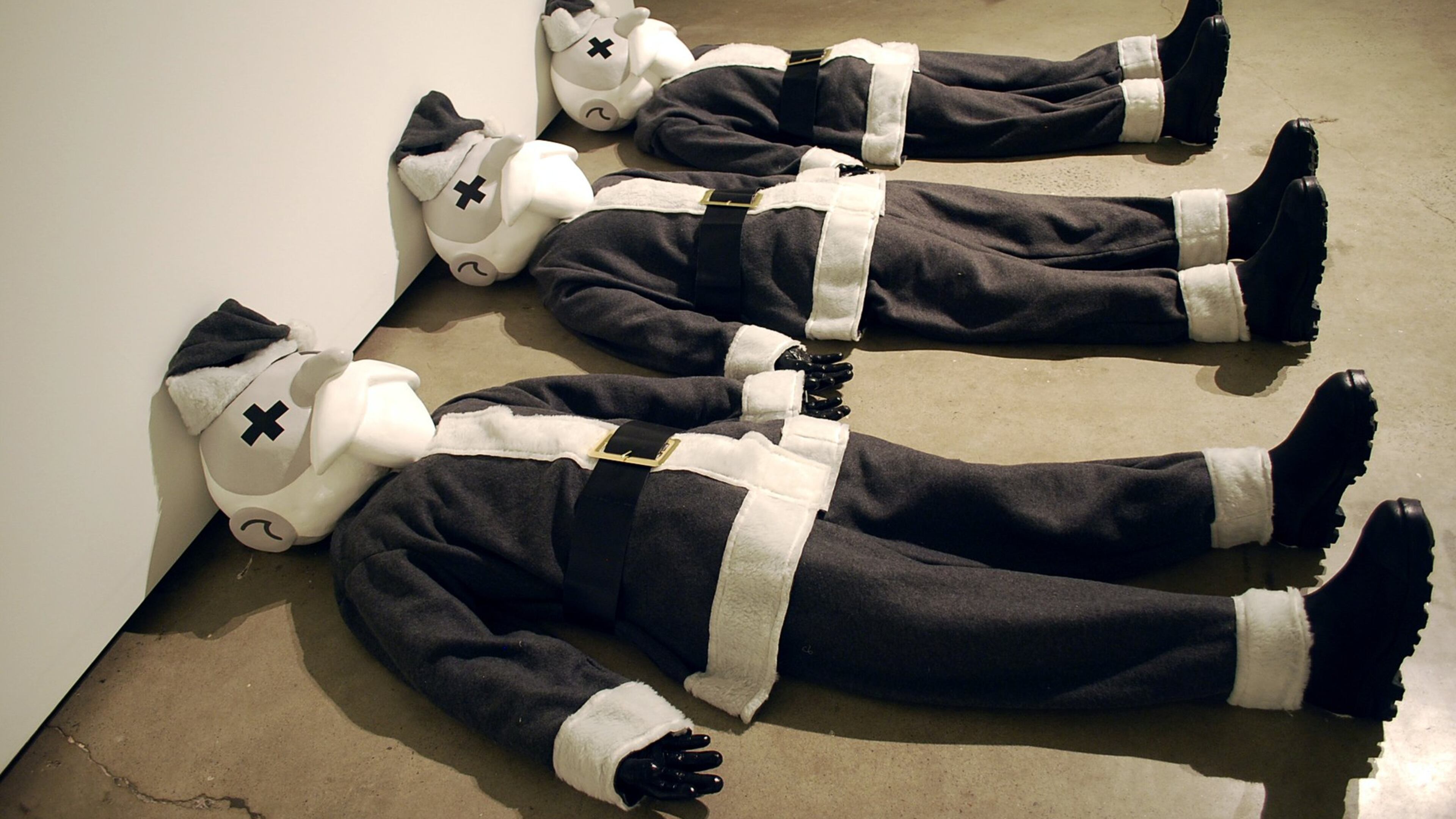 Artist Craig Drennen’s solo show “Bandit” features this sculpture in cast plastic, acrylic and custom suits, “Bandits.”