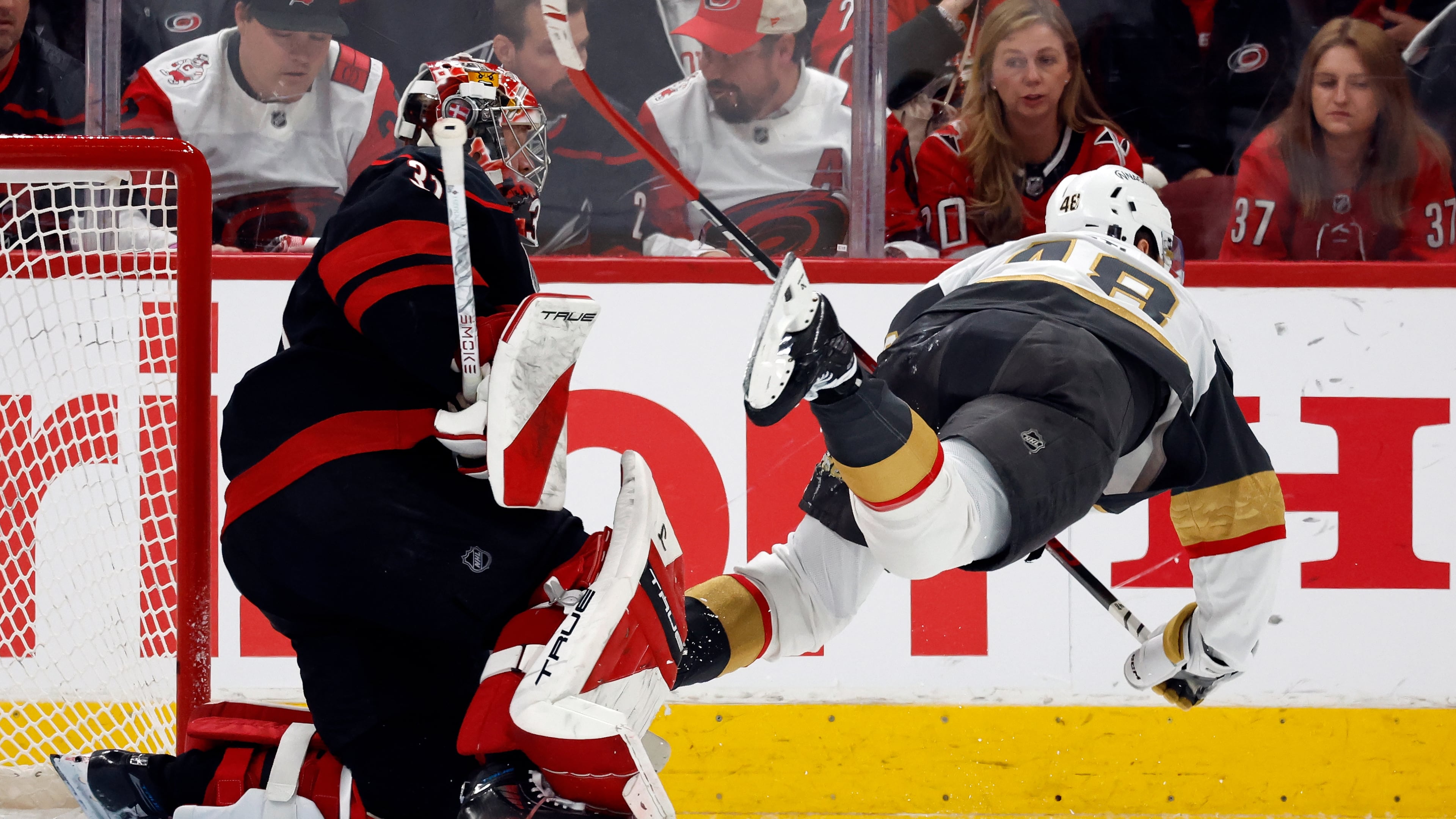 Vegas Golden Knights' Tomas Hertl (48) trips over Carolina Hurricanes goaltender Frederik Andersenn (31) during the second period in Game 1 of the NHL hockey Stanley Cup Final series in Raleigh, N.C., Tuesday, June 2, 2026. (AP Photo/Karl DeBlaker)